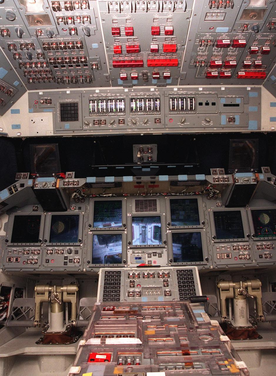 The cockpit of the orbiter Atlantis is revealed with its new full-color, flat panel Multifunction Electronic Display Subsystem (MEDS), also called the "glass cockpit." The recently installed MEDS upgrade improves crew/orbiter interaction with easy-to-read, graphic portrayals of key flight indicators like attitude display and mach speed. The installation makes Atlantis the most modern orbiter in the fleet and equals the systems on current commercial jet airliners and military aircraft. Atlantis is scheduled to fly on mission STS-101 in early December