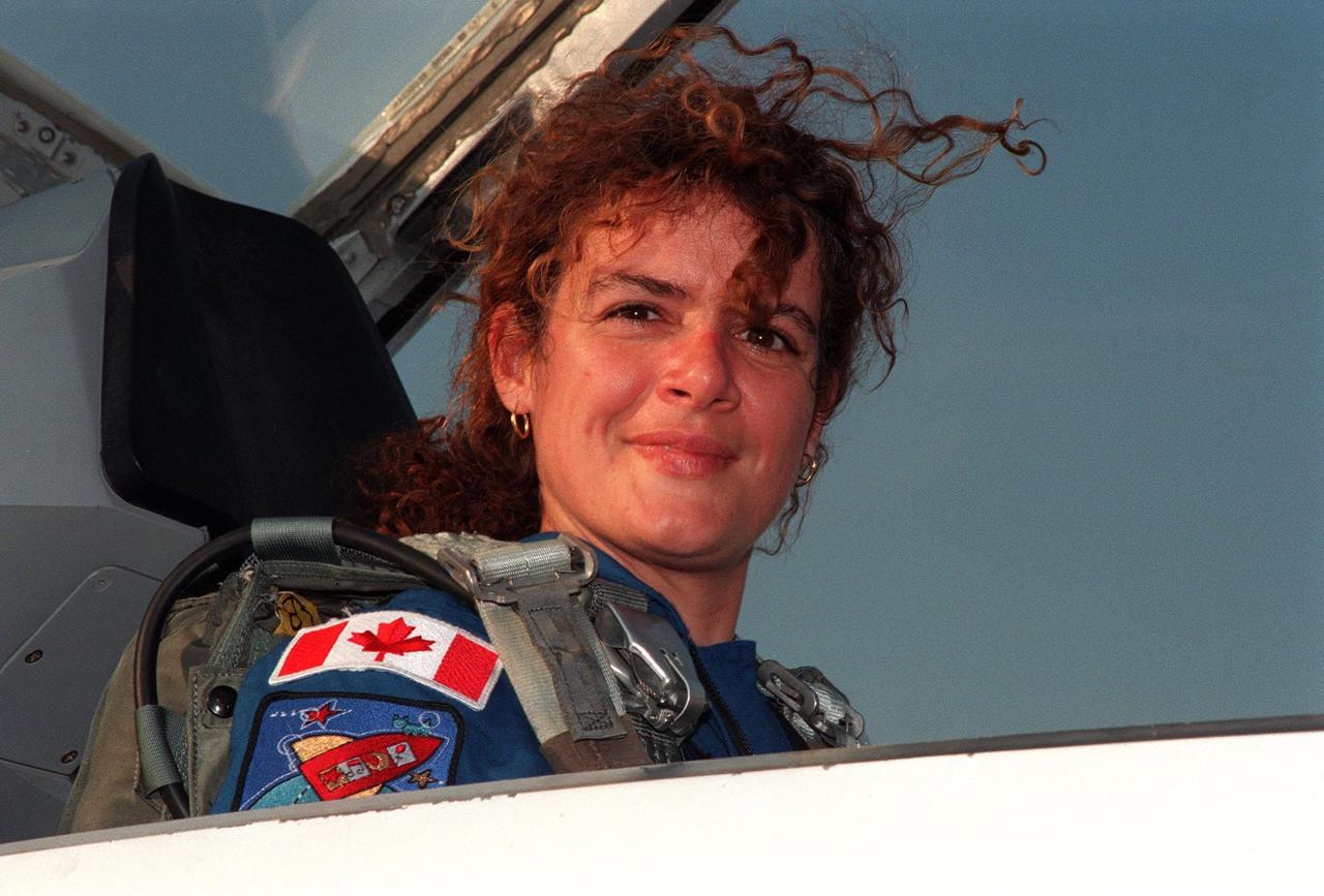 STS-96 Mission Specialist Julie Payette, who represents the Canadian Space Agency, arrives at the Shuttle Landing Facility in a T-38 jet aircraft. The STS-96 crew are taking part in Terminal Countdown Demonstration Test (TCDT) activities. The TCDT provides the crew with simulated countdown exercises, emergency egress training, and opportunities to inspect the mission payloads in the orbiter's payload bay. Mission STS-96, which is targeted for launch on May 20 at 9:32 a.m., is a logistics and resupply mission for the International Space Station, carrying such payloads as a Russian crane, the Strela; a U.S.-built crane; the Spacehab Oceaneering Space System Box (SHOSS), a logistics items carrier; and STARSHINE, a student-led experiment. Others in the STS-96 crew are Commander Kent V. Rominger, Pilot Rick Douglas Husband, and Mission Specialists Ellen Ochoa (Ph.D.), Tamara E. Jernigan (Ph.D.), Daniel Barry (M.D., Ph.D.), and Valery Ivanovich Tokarev, who represents the Russian Space Agency