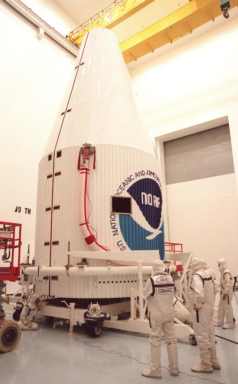 At Astrotech, Titusville, Fla., the fully encapsulated GOES-L weather satellite is ready for transfer to Launch Pad 36A, Cape Canaveral Air Station. The fourth of a new advanced series of geostationary weather satellites for the National Oceanic and Atmospheric Administration (NOAA), GOES-L is a three-axis inertially stabilized spacecraft that will provide pictures and perform atmospheric sounding at the same time. After it is launched, the satellite will undergo checkout and then provide backup capabilities for the existing, aging operational satellites. Once in orbit, the satellite will become GOES-11, joining GOES-8, GOES-9 and GOES-10 in space. The GOES is scheduled for launch aboard a Lockheed Martin Atlas II rocket later in May