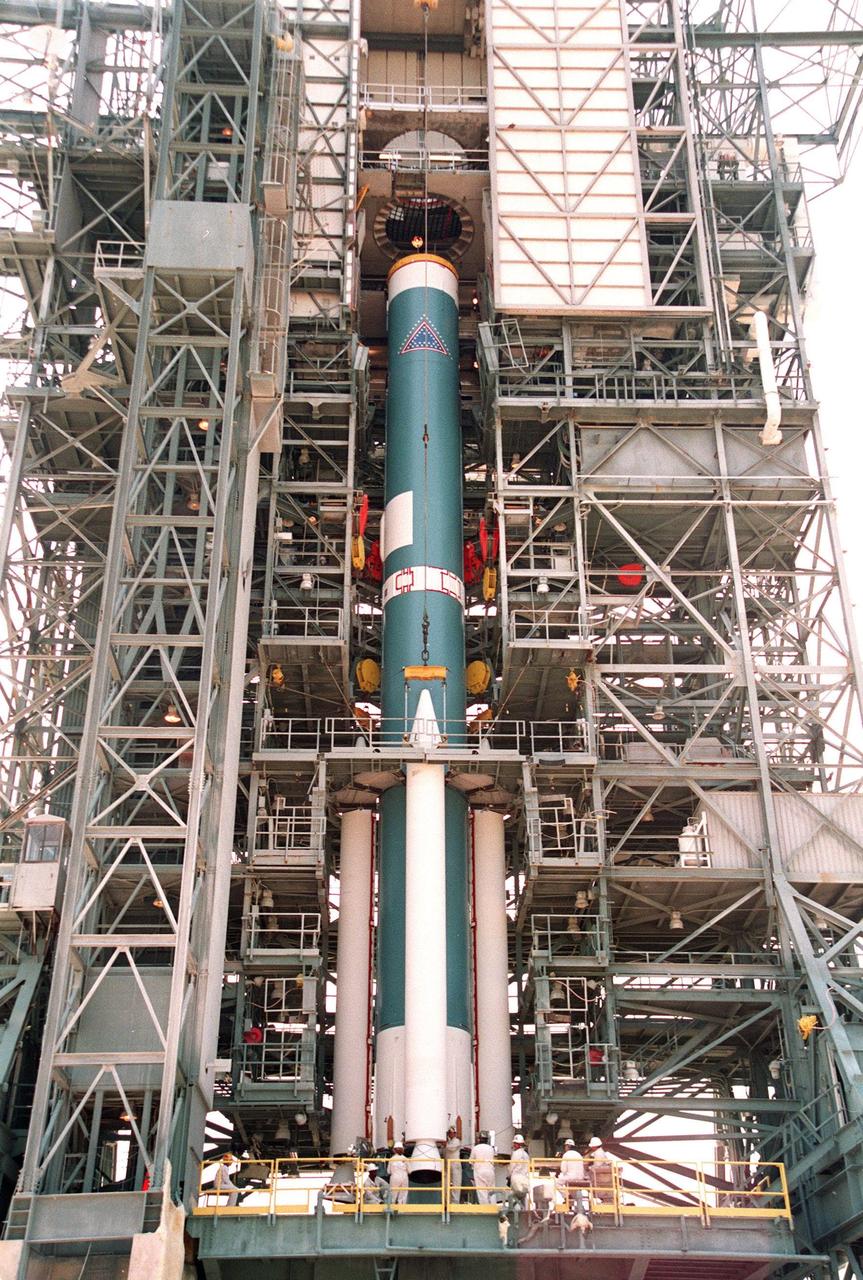 At Launch Pad 17A, Cape Canaveral Air Station (CCAS), the launch tower again encircles the Boeing Delta II rocket after being mated with its solid rocket boosters. The rocket is targeted to launch NASA's Far Ultraviolet Spectroscopic Explorer (FUSE) on June 23 at CCAS. Developed by The Johns Hopkins University under contract to Goddard Space Flight Center, Greenbelt, Md., FUSE will investigate the origin and evolution of the lightest elements in the universe hydrogen and deuterium. In addition, the FUSE satellite will examine the forces and process involved in the evolution of the galaxies, stars and planetary systems by investigating light in the far ultraviolet portion of the electromagnetic spectrum