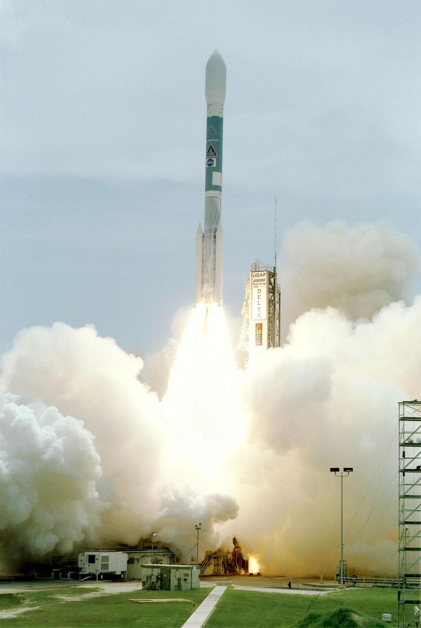 The Boeing Delta II rocket carrying NASA's Far Ultraviolet Spectroscopic Explorer (FUSE) satellite clears the tower after liftoff at 11:44 a.m. EDT from Launch Pad 17A, Cape Canaveral Air Station. FUSE was developed to investigate the origin and evolution of the lightest elements in the universe hydrogen and deuterium. In addition, the FUSE satellite will examine the forces and process involved in the evolution of the galaxies, stars and planetary systems by investigating light in the far ultraviolet portion of the electromagnetic spectrum