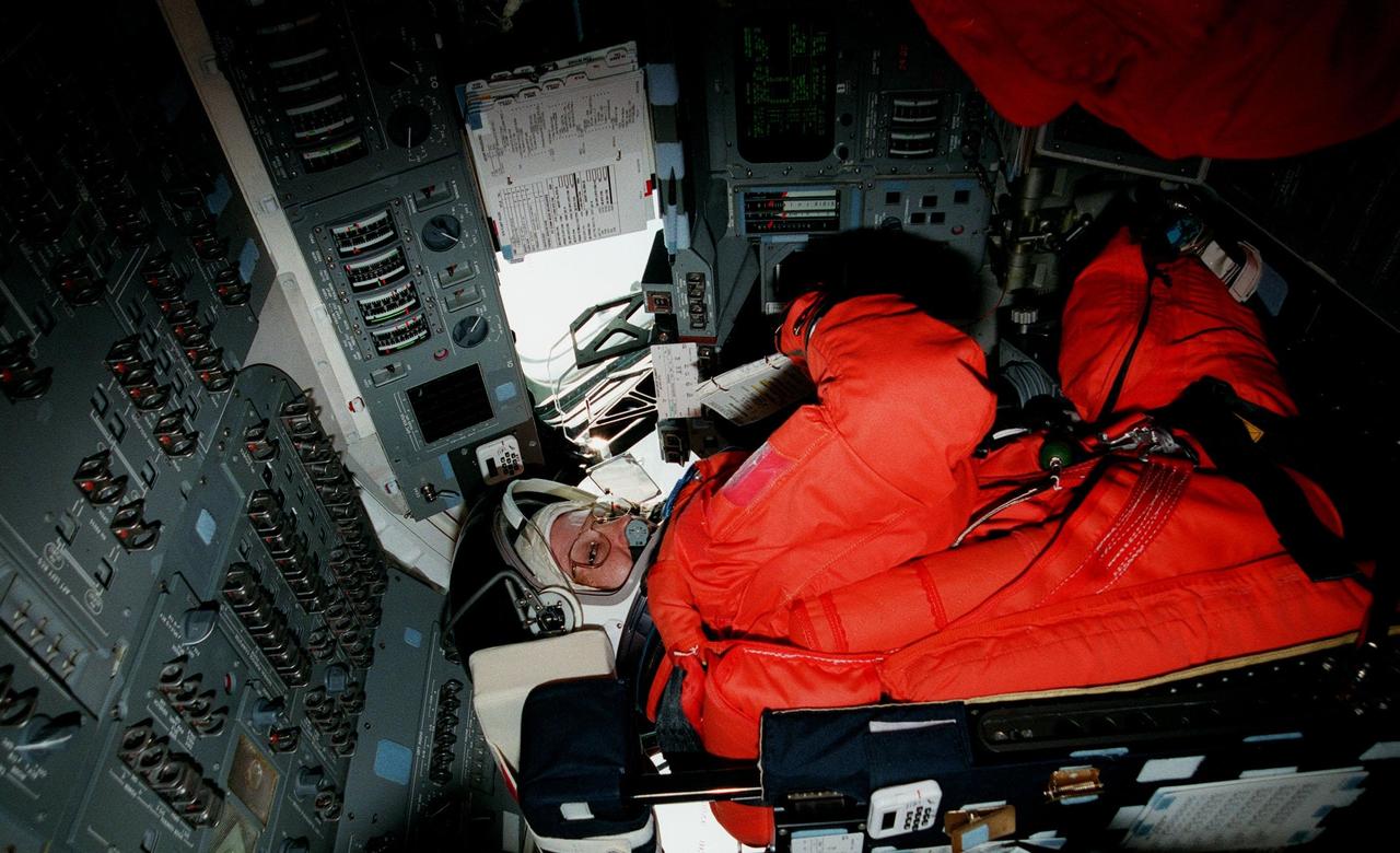 STS-93 Commander Eileen M. Collins sits on the flight deck of the orbiter Columbia during Terminal Countdown Demonstration Test (TCDT) activities that include emergency exit training and a launch-day dress rehearsal culminating with a simulated main engine cut-off. Other crew members participating are Pilot Jeffrey S. Ashby, and Mission Specialists Catherine G. Coleman (Ph.D.), Steven A. Hawley (Ph.D.) and Michel Tognini of France, who represents the Centre National d'Etudes Spatiales (CNES). Collins is the first woman to serve as a Shuttle commander. The primary mission of STS-93 is the release of the Chandra X-ray Observatory, which will allow scientists from around the world to obtain unprecedented X-ray images of exotic environments in space to help understand the structure and evolution of the universe. The targeted launch date for STS-93 is no earlier than July 20 at 12:36 a.m. EDT from Launch Pad 39B