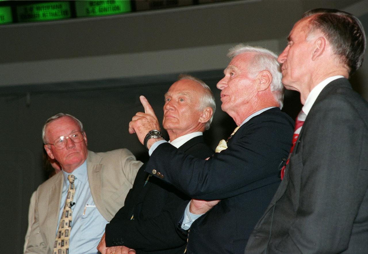 KENNEDY SPACE CENTER, FLA. -- At a media conference in the Apollo/Saturn V Center, former Apollo astronaut Gene Cernan, who flew on Apollo 10 and 17, makes a point in a comment for the press. Joining him in the conference are other Apollo astronauts (left) Neil A. Armstrong and Edwin "Buzz" Aldrin, who both flew on Apollo 11, the launch to the moon; and (right) Walt Cunningham, who flew on Apollo 7. The four astronauts were at KSC for the 30th anniversary of the Apollo 11 launch and moon landing, July 16 and July 20, 1969. Neil Armstrong was the first man to set foot on the moon