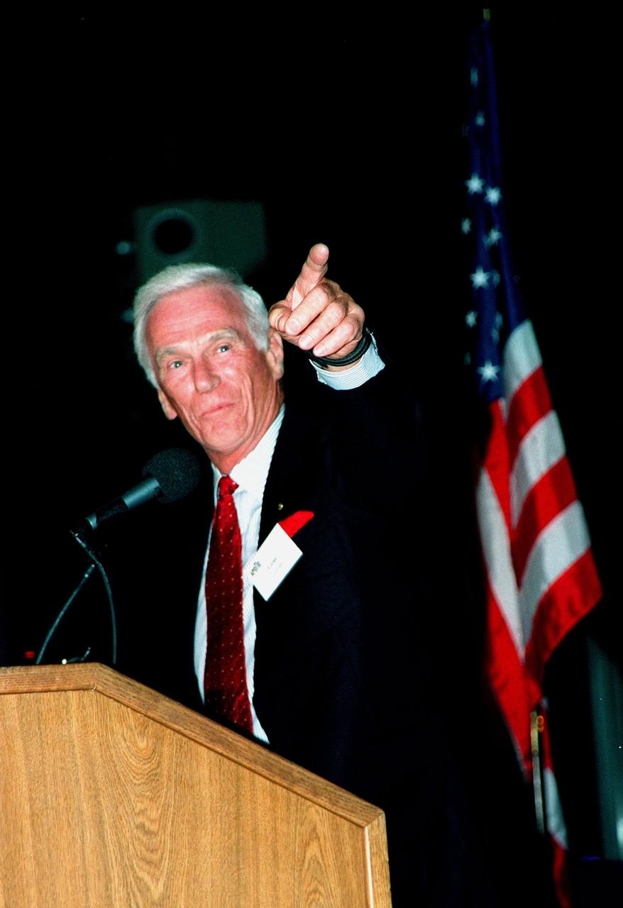 KENNEDY SPACE CENTER, FLA. -- Former Apollo astronaut Gene Cernan makes a point during a presentation at the Apollo 11 anniversary banquet honoring the Apollo team, the people who made the entire lunar landing program possible. The banquet was held in the Apollo/Saturn V Center, part of the KSC Visitor Complex. This is the 30th anniversary of the Apollo 11 launch and moon landing, July 16 and July 20, 1969. Cernan appeared with other former astronauts Neil Armstrong, the first man to walk on the moon; Edwin "Buzz" Aldrin; Walt Cunningham; and others