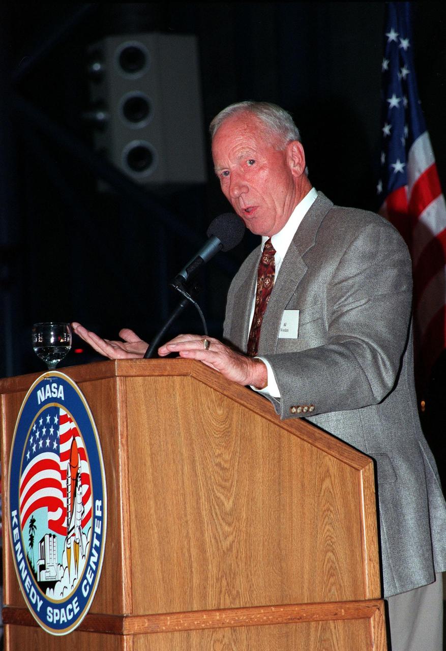 KENNEDY SPACE CENTER, FLA. -- Former Apollo 15 astronaut Alfred M. Worden relates his experiences in the Apollo Program during a banquet honoring the people who made it all possible. Held on the anniversary of the Apollo 11 mission, which was launched July 16, 1969, and landed on the moon July 20, 1969, the banquet was held in the Apollo/Saturn V Center. Worden served as command module pilot on the Apollo 15 mission. Other guests at the banquet were astronauts Neil Armstrong, Wally Schirra, Edwin "Buzz" Aldrin and Walt Cunningham. Armstrong was the first man to walk on the moon; Gene Cernan was the last