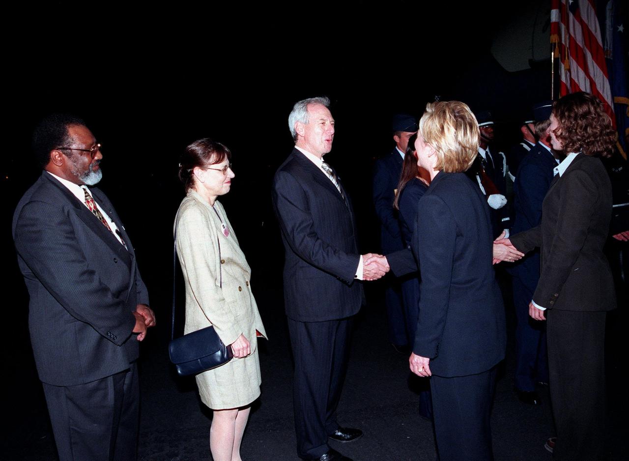 First Lady Hillary Rodham Clinton and her daughter, Chelsea, are greeted by NASA Administrator Daniel S. Goldin upon their arrival at the Skid Strip at Cape Canaveral Air Station. Next to Gold are (from left) Deputy Director for Business Operations Jim Jennings and Mrs. Goldin. Mrs. Clinton and Chelsea are here to view the launch of Space Shuttle mission STS-93, scheduled for 12:36 a.m. EDT July 20. Much attention has been generated over the launch due to Commander Eileen M. Collins, the first woman to serve as commander of a Shuttle mission. The primary payload of the five-day mission is the Chandra X-ray Observatory, which will allow scientists from around the world to study some of the most distant, powerful and dynamic objects in the universe. The new telescope is 20 to 50 times more sensitive than any previous X-ray telescope and is expected to unlock the secrets of supernovae, quasars and black holes