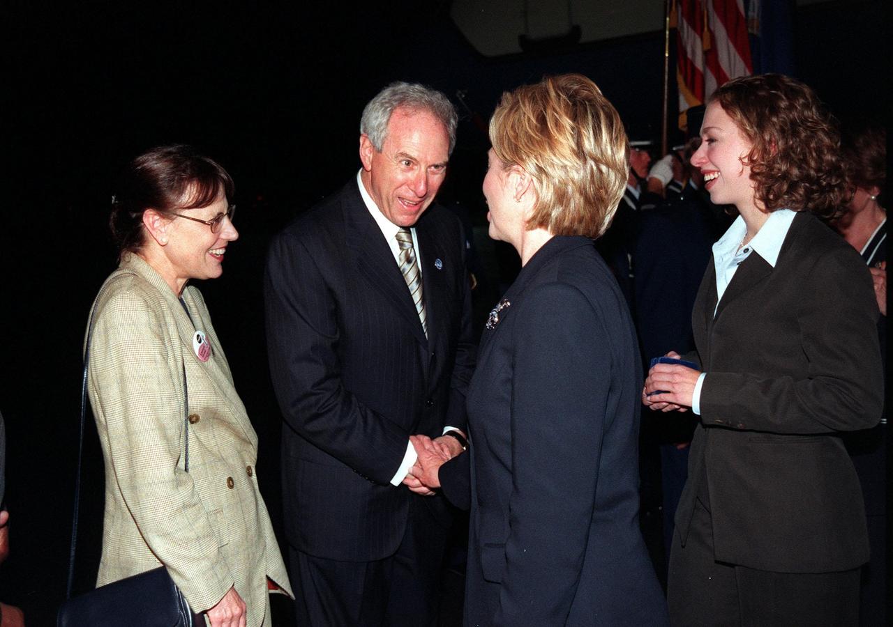 Upon their arrival at the Skid Strip at Cape Canaveral Air Station, First Lady Hillary Rodham Clinton and her daughter, Chelsea, are greeted by NASA Administrator Daniel S. Goldin and Mrs. Goldin. Mrs. Clinton and Chelsea are here to view the launch of Space Shuttle mission STS-93, scheduled for 12:36 a.m. EDT July 20. Much attention has been generated over the launch due to Commander Eileen M. Collins, the first woman to serve as commander of a Shuttle mission. The primary payload of the five-day mission is the Chandra X-ray Observatory, which will allow scientists from around the world to study some of the most distant, powerful and dynamic objects in the universe. The new telescope is 20 to 50 times more sensitive than any previous X-ray telescope and is expected to unlock the secrets of supernovae, quasars and black holes