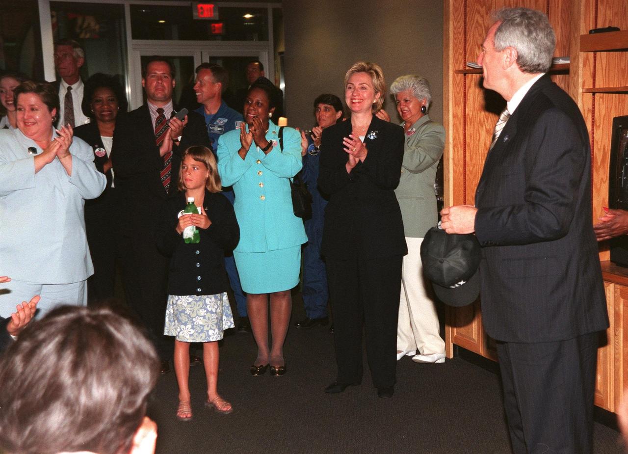 KENNEDY SPACE CENTER, FLA. -- In the VIP Lounge, Apollo/Saturn V Center, First Lady Hillary Rodham Clinton gets ready to speak to the group gathered there before the launch of STS-93. At right is NASA Administrator Daniel Goldin. Liftoff of Space Shuttle Columbia is scheduled for 12:36 a.m. EDT July 20. Much attention has been generated over the launch due to Commander Eileen M. Collins, the first woman to serve as commander of a Shuttle mission. The primary payload of the five-day mission is the Chandra X-ray Observatory, which will allow scientists from around the world to study some of the most distant, powerful and dynamic objects in the universe. The new telescope is 20 to 50 times more sensitive than any previous X-ray telescope and is expected to unlock the secrets of supernovae, quasars and black holes