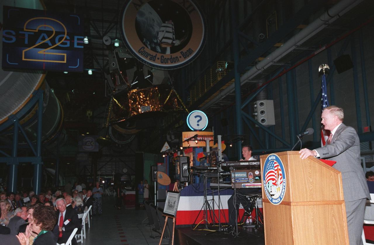 KENNEDY SPACE CENTER, FLA. -- At an anniversary banquet honoring the Apollo program team, the people who made the entire lunar landing program possible, Center Director Roy D. Bridges offers remarks. The banquet was held in the Apollo/Saturn V Center, part of the KSC Visitor Complex. This is the 30th anniversary of the Apollo 11 launch and moon landing, July 16 and July 20, 1969. Among the guests at the banquet were astronauts Neil Armstrong, Edwin "Buzz" Aldrin, Wally Schirra, Gene Cernan and Walt Cunningham. Neil Armstrong was the first man to walk on the moon; Gene Cernan was the last