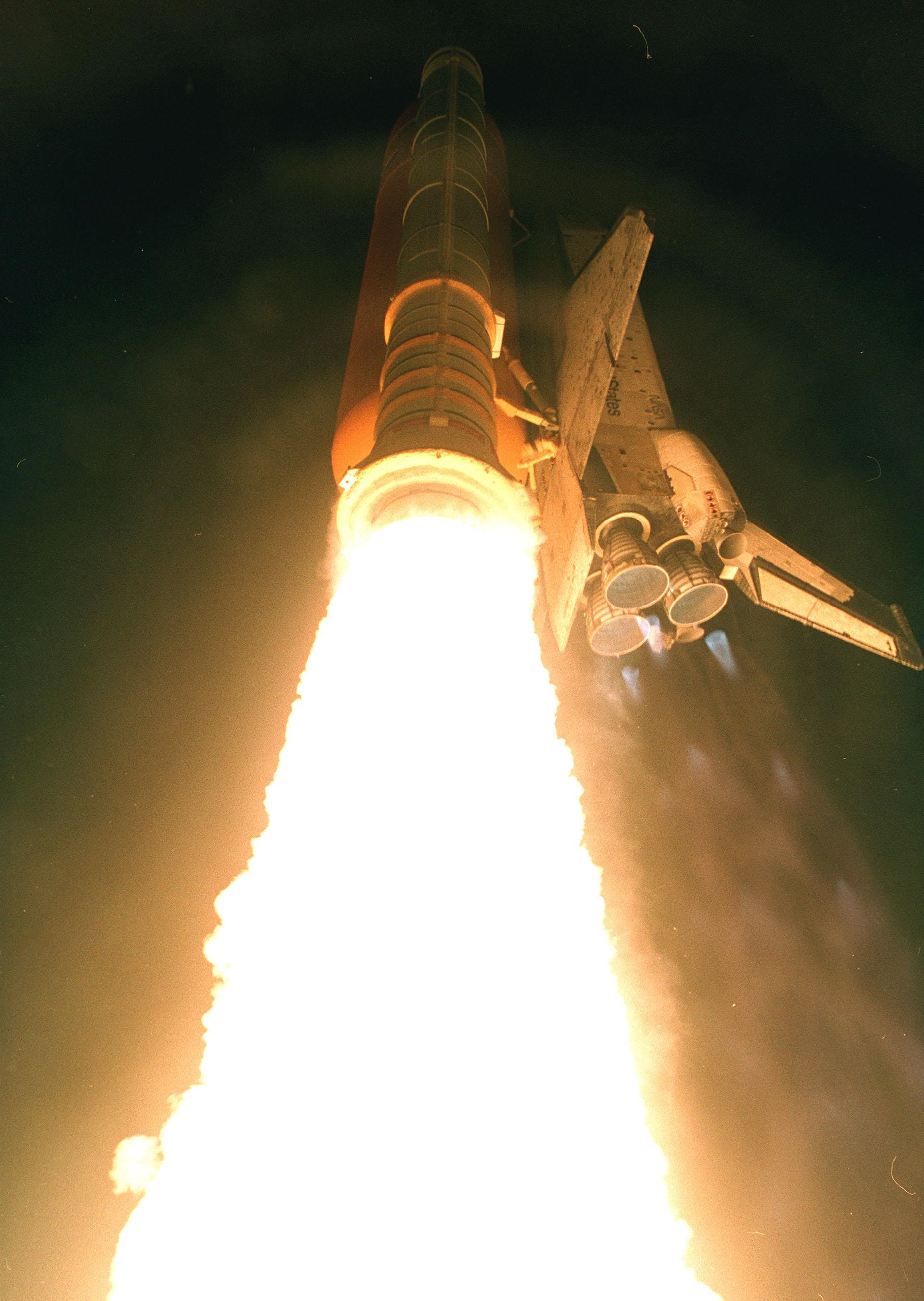 View of Space Shuttle Columbia as it launches into the night sky