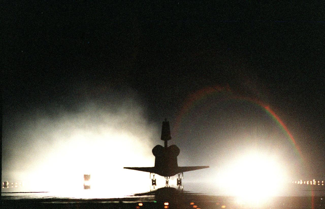 KENNEDY SPACE CENTER, Fla. -- The Space Shuttle orbiter Columbia touches down on runway 33 at the Shuttle Landing Facility after a successful mission of nearly five days and 1.8 million miles. Main gear touchdown was at 11:20:35 p.m. EDT on July 27. Aboard are the STS-93 crew members: Commander Eileen M. Collins, Pilot Jeffrey S. Ashby, and Mission Specialists Steven A. Hawley (Ph.D.), Catherine G. Coleman (Ph.D.) and Michel Tognini of France, with the Centre National d'Etudes Spatiales (CNES). The mission's primary objective was to deploy the Chandra X-ray Observatory, which will allow scientists from around the world to study some of the most distant, powerful and dynamic objects in the universe. This was the 95th flight in the Space Shuttle program and the 26th for Columbia. The landing was the 19th consecutive Shuttle landing in Florida and the 12th night landing in Shuttle program history