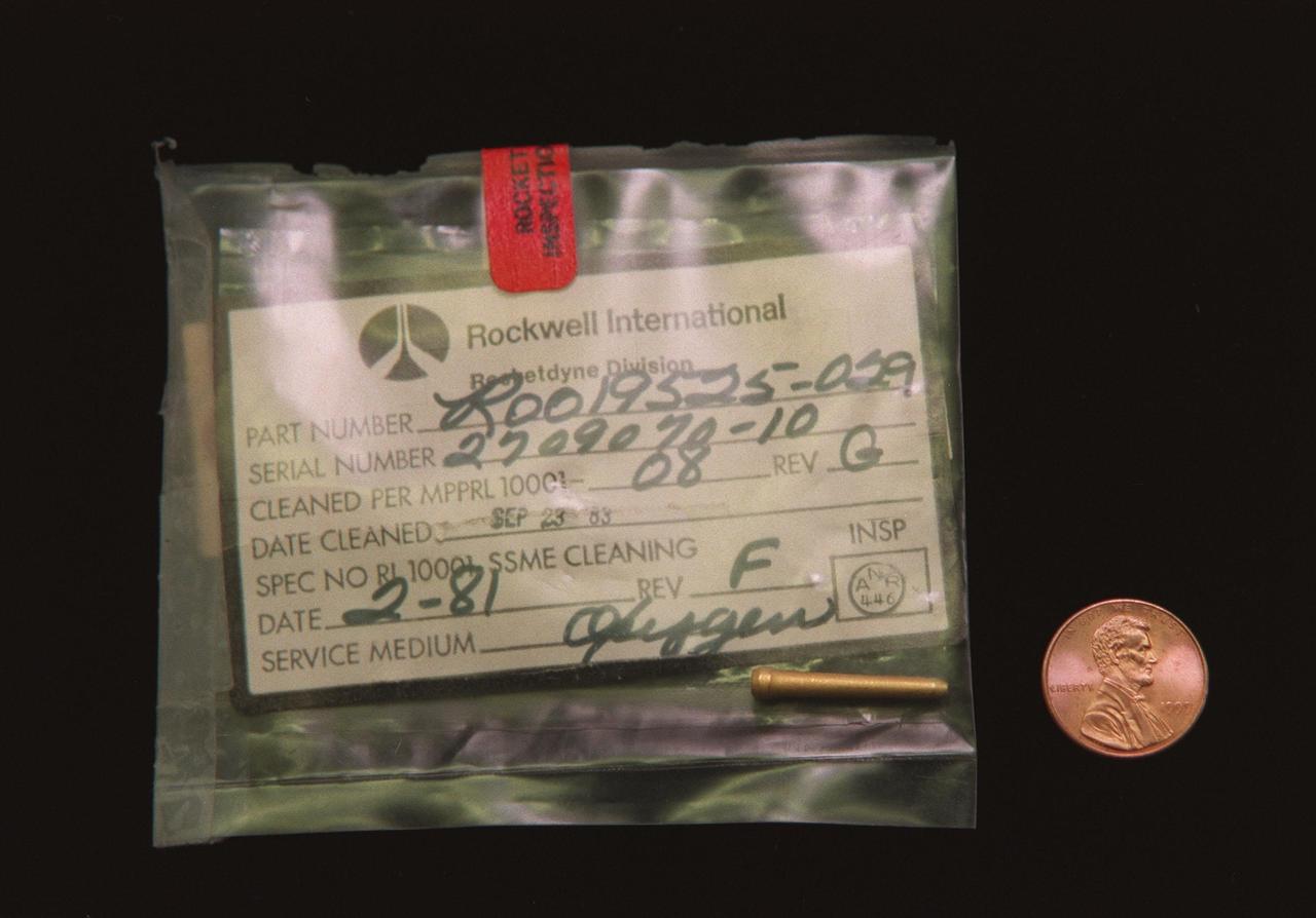 Engineers are investigating the possibility that a 7/8" gold-plated liquid oxygen post plug became dislodged and created three small holes in the liquid hydrogen tubes inside the nozzle on main engine No. 3 on Space Shuttle Columbia. The holes caused a hydrogen leak during the STS-93 launch of Columbia on July 23