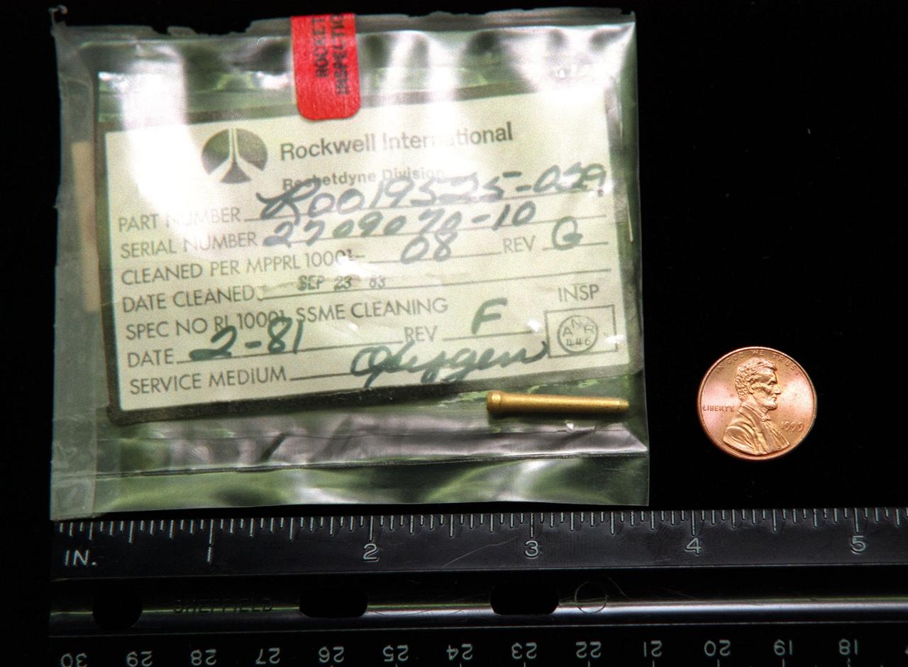 Engineers are investigating the possibility that a 7/8" gold-plated liquid oxygen post plug became dislodged and created three small holes in the liquid hydrogen tubes inside the nozzle on main engine No. 3 on Space Shuttle Columbia. The holes caused a hydrogen leak during the STS-93 launch of Columbia on July 23