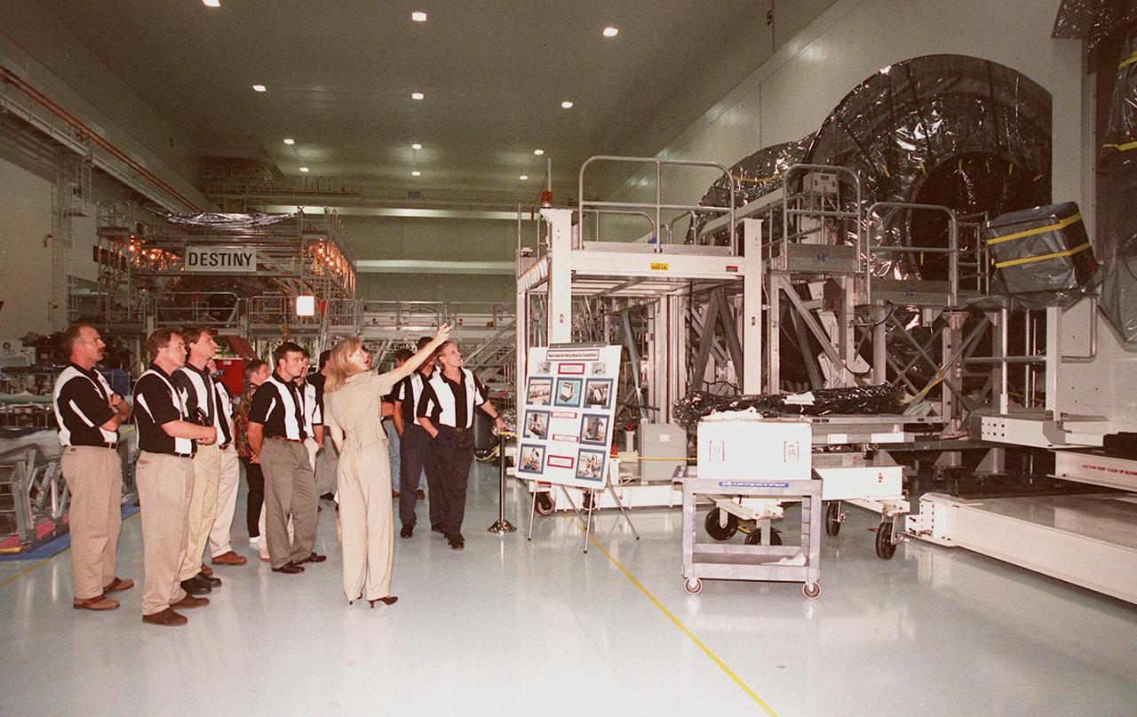 KENNEDY SPACE CENTER, FLA. -- In the Space Station Processing Facility (SSPF), members of the 1998 astronaut candidate class (group 17) are shown future components of the International Space Station, such as the Multi-Purpose Logistics Module at right. The class is taking part in training activities, including fire training and a flight awareness program, plus touring the OPF, VAB, SSME Processing Facility, launch pads, SLF, Apollo/Saturn V Center, the crew headquarters, as well as the SSPF. The U.S. candidates in the '98 class are Clayton C. Anderson, Lee J. Archambault, Tracy E. Caldwell (Ph.D.), Gregory E. Chamitoff (Ph.D.), Timothy J. Creamer, Christopher J. Ferguson, Michael J. Foreman, Michael E. Fossum, Kenneth T. Ham, Patricia C. Hilliard (M.D.), Gregory C. Johnson, Gregory H. Johnson, Stanley G. Love (Ph.D.), Leland D. Melvin, Barbara R. Morgan, William A. Oefelein, John D. Olivas (Ph.D.), Nicholas J.M. Patrick (Ph.D.), Alan G. Poindexter, Garrett E. Reisman (Ph.D.), Steven R. Swanson, Douglas H. Wheelock, Sunita L. Williams, Neil W. Woodward III, George D. Zamka; and the international candidates are Leopold Eyharts, Paolo Nespoli, Hans Schlegel, Roberto Vittori, Bjarni V. Tryggvason, and Marcos Pontes