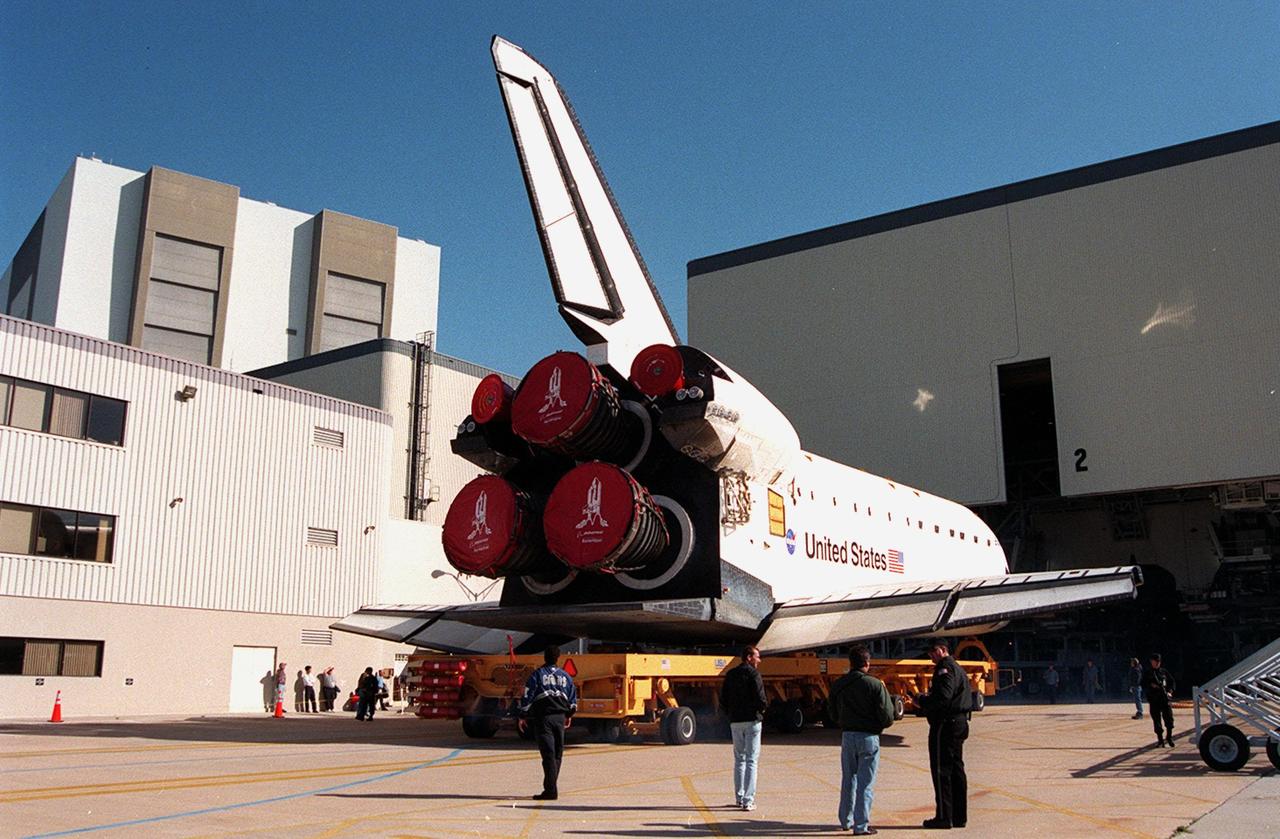 KENNEDY SPACE CENTER, FLA. -- Orbiter Endeavour rolls out of the Orbiter Processing Facility bay 2 for transfer to the Vehicle Assembly Building. There it will be mated to the external tank and solid rocket boosters in high bay 1. Space Shuttle Endeavour is targeted for launch on mission STS-99 Jan. 13, 2000 at 1:11 p.m. EST. STS-99 is the Shuttle Radar Topography Mission, an international project spearheaded by the National Imagery and Mapping Agency and NASA, with participation of the German Aerospace Center DLR. The SRTM consists of a specially modified radar system that will gather data for the most accurate and complete topographic map of the Earth's surface that has ever been assembled. SRTM will make use of radar interferometry, wherein two radar images are taken from slightly different locations. Differences between these images allow for the calculation of surface elevation, or change. The SRTM hardware will consist of one radar antenna in the shuttle payload bay and a second radar antenna attached to the end of a mast extended 60 meters (195 feet) out from the shuttle