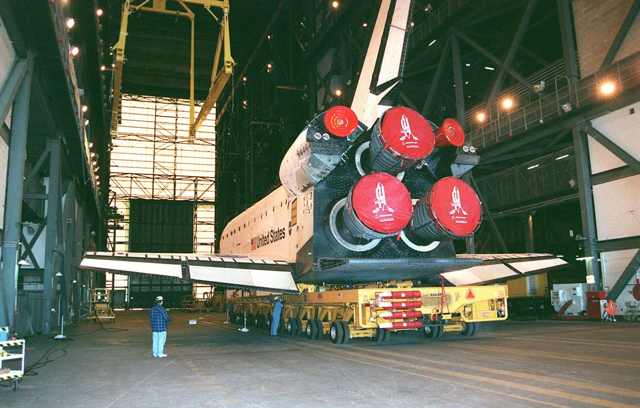 KENNEDY SPACE CENTER, FLA. -- Orbiter Endeavour rolls inside the Vehicle Assembly Building where it will be lifted to vertical and mated to the external tank and solid rocket boosters in high bay 1. Space Shuttle Endeavour is targeted for launch on mission STS-99 Jan. 13, 2000 at 1:11 p.m. EST. STS-99 is the Shuttle Radar Topography Mission, an international project spearheaded by the National Imagery and Mapping Agency and NASA, with participation of the German Aerospace Center DLR. The SRTM consists of a specially modified radar system that will gather data for the most accurate and complete topographic map of the Earth's surface that has ever been assembled. SRTM will make use of radar interferometry, wherein two radar images are taken from slightly different locations. Differences between these images allow for the calculation of surface elevation, or change. The SRTM hardware will consist of one radar antenna in the shuttle payload bay and a second radar antenna attached to the end of a mast extended 60 meters (195 feet) out from the shuttle