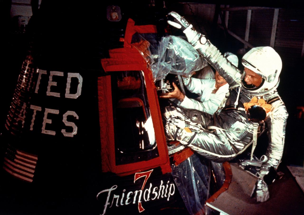 Project Mercury astronaut John H. Glenn Jr., enters the Friendship 7 spacecraft during the last part of the countdown on Feb. 20, 1962. At 9:47 a.m. EST, the Atlas launch vehicle lifted the spacecraft into orbit for a three-orbit mission lasting four hours, 55 minutes and 23 seconds. Glenn and his spacecraft were recovered by the destroyer Noa just 21 minutes after landing in the Atlantic near Grand Turk Island, to successfully complete the nation's first manned orbital flight.