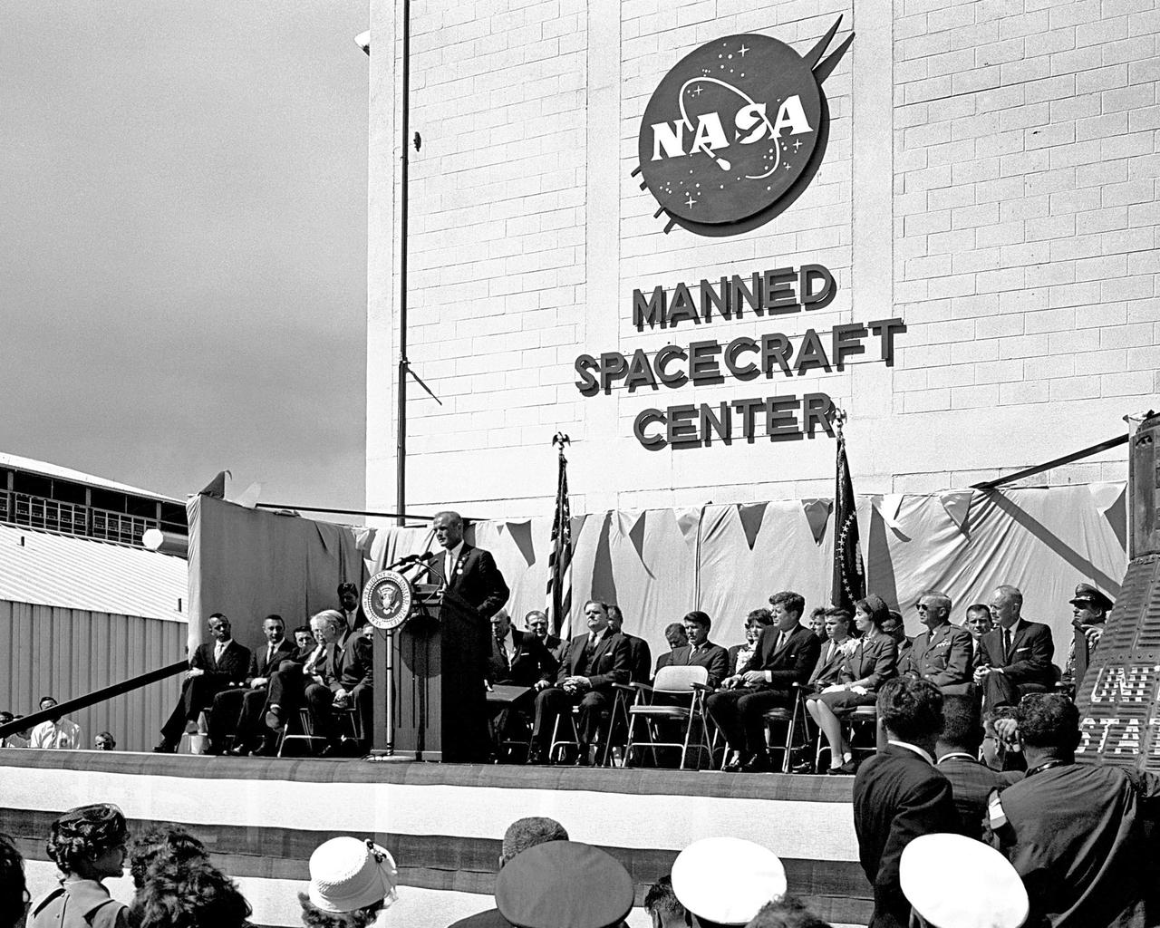 CAPE CANAVERAL, Fla. -- President John F. Kennedy honors John H. Glenn Jr. at Hangar S, Cape Canaveral, Florida, after his historic three-orbit mission aboard Friendship 7. Photo credit: NASA