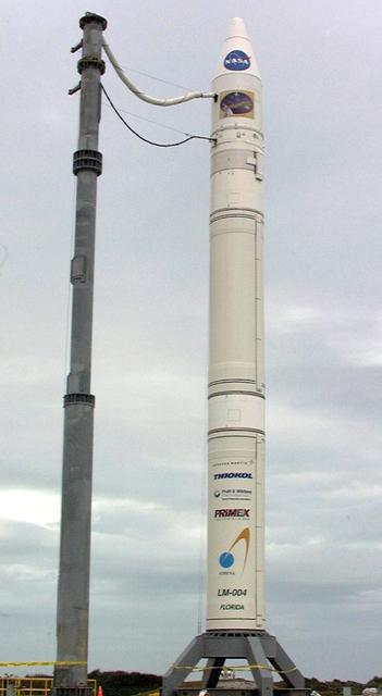 NASA’s Lunar Prospector is readied for launch as its gantry-like service tower is rolled back again at Cape Canaveral Air Station’s Launch Complex 46. The launch, previously scheduled for Jan. 5, was postponed one day due to a problem with a range safety radar located at Patrick Air Force Base, Fla. Lunar Prospector, built for the NASA Ames Research Center by Lockheed Martin, is a spin-stabilized spacecraft designed to provide NASA with the first global maps of the Moon’s surface and its gravitational magnetic fields, as well as look for the possible presence of ice near the lunar poles. It will orbit the Moon at an altitude of approximately 63 miles during a one-year mission. The launch of Lunar Prospector is now scheduled for Jan. 6, 1998 at 9:28 p.m. EST