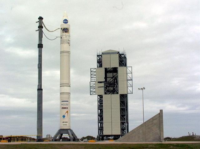 NASA’s Lunar Prospector is readied for launch as its gantry-like service tower is rolled back again at Cape Canaveral Air Station’s Launch Complex 46. The launch, previously scheduled for Jan. 5, was postponed one day due to a problem with a range safety radar located at Patrick Air Force Base, Fla. Lunar Prospector, built for the NASA Ames Research Center by Lockheed Martin, is a spin-stabilized spacecraft designed to provide NASA with the first global maps of the Moon’s surface and its gravitational magnetic fields, as well as look for the possible presence of ice near the lunar poles. It will orbit the Moon at an altitude of approximately 63 miles during a one-year mission. The launch of Lunar Prospector is now scheduled for Jan. 6, 1998 at 9:28 p.m. EST