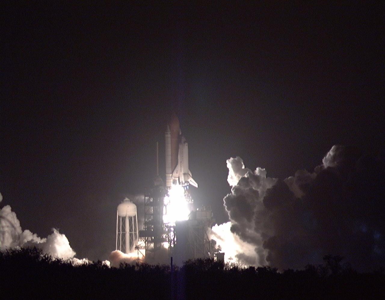 The Space Shuttle Endeavour cuts a bright swath through the dark sky as it blazes a trail toward the Russian Space Station Mir. Endeavour lifted off successfully at its scheduled time of 9:48:15 p.m. EST on Jan. 22 from Pad 39A. STS-89 is the eighth docking with the Russian Space Station Mir, the first Mir docking for Endeavour (all previous dockings were made by Atlantis), and the first launch of 1998. After docking with Mir, Mission Specialist Andrew Thomas, Ph.D., will transfer to the space station, succeeding David Wolf, M.D., who will return to Earth aboard Endeavour. Dr. Thomas will live and work on Mir until June