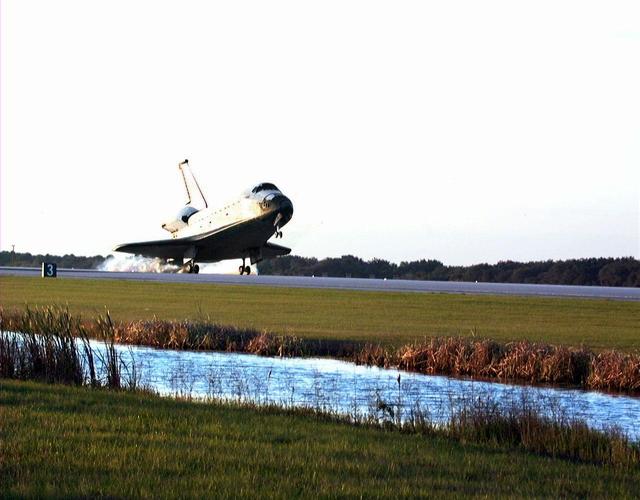 With Commander Kevin Kregel and Pilot Steven Lindsey at the controls, the orbiter Columbia touches its main gear down on Runway 33 at KSC’s Shuttle Landing Facility at 7:20:04 a.m. EST Dec. 5 to complete the 15-day, 16-hour and 34-minute-long STS-87 mission of 6.5 million miles. Also onboard the orbiter are Mission Specialists Winston Scott; Kalpana Chawla, Ph.D.; and Takao Doi, Ph.D., of the National Space Development Agency of Japan; along with Payload Specialist Leonid Kadenyuk of the National Space Agency of Ukraine. During the 88th Space Shuttle mission, the crew performed experiments on the United States Microgravity Payload-4 and pollinated plants as part of the Collaborative Ukrainian Experiment. This was the 12th landing for Columbia at KSC and the 41st KSC landing in the history of the Space Shuttle program
