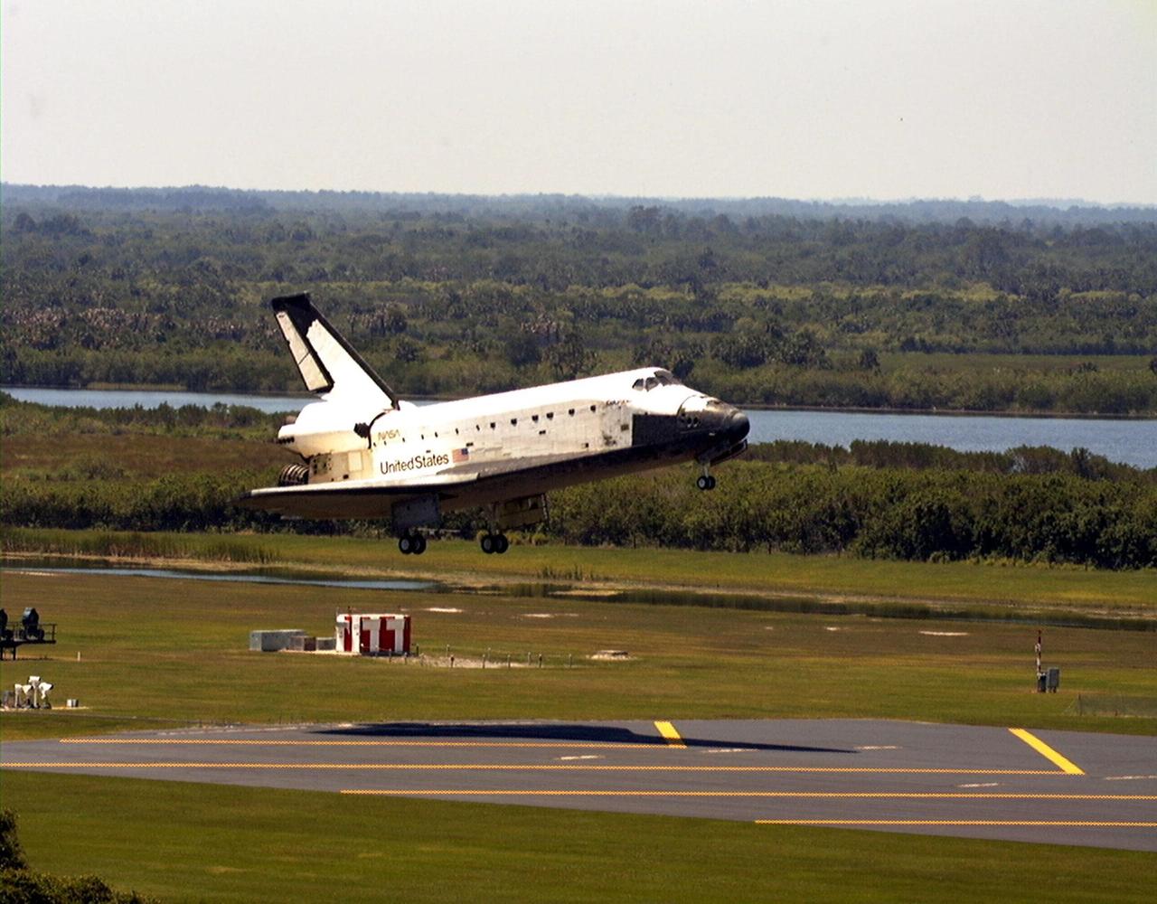 KENNEDY SPACE CENTER, FLA. -- The orbiter Columbia is about to touch down on Runway 33 of KSC's Shuttle Landing Facility to complete the nearly 16-day STS-90 mission. Main gear touchdown was at 12:08:59 p.m. EDT on May 3, 1998, landing on orbit 256 of the mission. The wheels stopped at 12:09:58 EDT, completing a total mission time of 15 days, 21 hours, 50 minutes and 58 seconds. The 90th Shuttle mission was Columbia's 13th landing at the space center and the 43rd KSC landing in the history of the Space Shuttle program. During the mission, the crew conducted research to contribute to a better understanding of the human nervous system. The crew of the STS-90 Neurolab mission include Commander Richard Searfoss; Pilot Scott Altman; Mission Specialists Richard Linnehan, D.V.M., Dafydd (Dave) Williams, M.D., with the Canadian Space Agency, and Kathryn (Kay) Hire; and Payload Specialists Jay Buckey, M.D., and James Pawelczyk, Ph.D