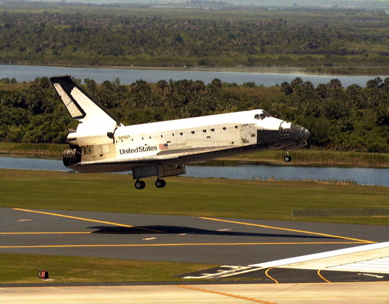 KENNEDY SPACE CENTER, FLA. -- The orbiter Columbia is moments from touchdown on Runway 33 of KSC's Shuttle Landing Facility to complete the nearly 16-day STS-90 mission. Main gear touchdown was at 12:08:59 p.m. EDT on May 3, 1998, landing on orbit 256 of the mission. The wheels stopped at 12:09:58 EDT, completing a total mission time of 15 days, 21 hours, 50 minutes and 58 seconds. The 90th Shuttle mission was Columbia's 13th landing at the space center and the 43rd KSC landing in the history of the Space Shuttle program. During the mission, the crew conducted research to contribute to a better understanding of the human nervous system. The crew of the STS-90 Neurolab mission include Commander Richard Searfoss; Pilot Scott Altman; Mission Specialists Richard Linnehan, D.V.M., Dafydd (Dave) Williams, M.D., with the Canadian Space Agency, and Kathryn (Kay) Hire; and Payload Specialists Jay Buckey, M.D., and James Pawelczyk, Ph.D