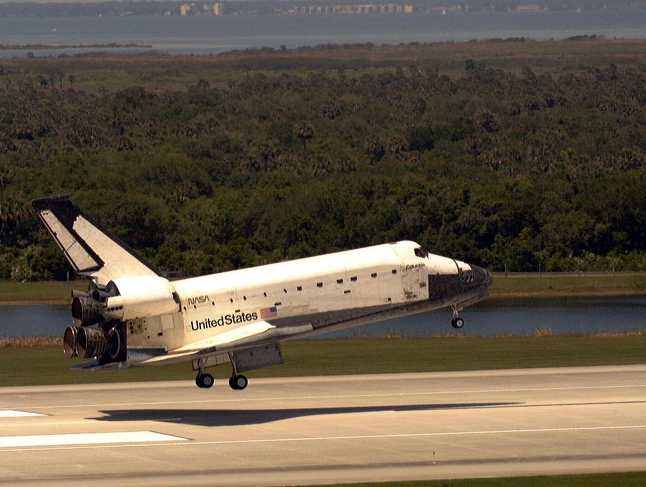 KENNEDY SPACE CENTER, FLA. -- The orbiter Columbia is about to touch down on Runway 33 of KSC's Shuttle Landing Facility to complete the nearly 16-day STS-90 mission. Main gear touchdown was at 12:08:59 p.m. EDT on May 3, 1998, landing on orbit 256 of the mission. The wheels stopped at 12:09:58 EDT, completing a total mission time of 15 days, 21 hours, 50 minutes and 58 seconds. The 90th Shuttle mission was Columbia's 13th landing at the space center and the 43rd KSC landing in the history of the Space Shuttle program. During the mission, the crew conducted research to contribute to a better understanding of the human nervous system. The crew of the STS-90 Neurolab mission include Commander Richard Searfoss; Pilot Scott Altman; Mission Specialists Richard Linnehan, D.V.M., Dafydd (Dave) Williams, M.D., with the Canadian Space Agency, and Kathryn (Kay) Hire; and Payload Specialists Jay Buckey, M.D., and James Pawelczyk, Ph.D