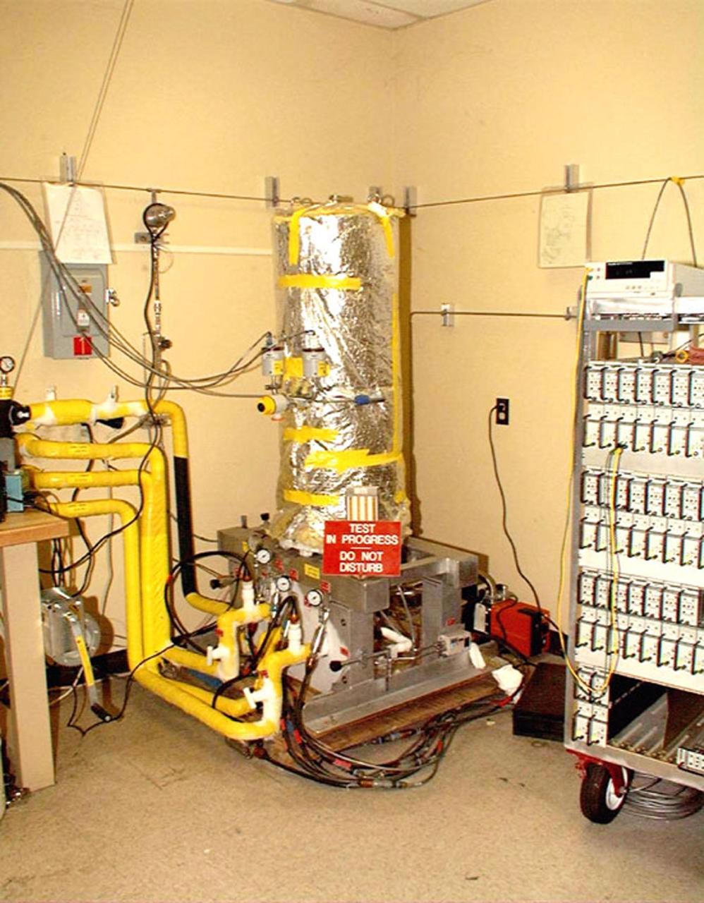 Materials are being tested in the Kennedy Space Center's cryogenics test bed laboratory. The cryogenics laboratory is expanding to a larger test bed facility in order to offer research and development capabilities that will benefit projects originating from KSC, academia and private industry. Located in KSC's industrial area, the lab is equipped with a liquid nitrogen flow test area to test and evaluate cryogenic valves, flow-meters and other handling equipment in field conditions. A 6,000-gallon tank supplies liquid to low-flow and high-flow test sections. KSC engineers and scientists can also build system prototypes and then field test and analyze them with the center's unique equipment. Expanded cryogenic infrastructure will posture the Space Coast to support biological and medical researchers who use liquid nitrogen to preserve and store human and animal cells and to destroy cancer tissue using cryosurgery; hospitals that use superconductive magnets cooled in liquid helium for magnetic resonance imaging (MRI); the food industry, which uses liquid nitrogen for freezing and long-term storage; as well as the next generation of reusable launch vehicles currently in development