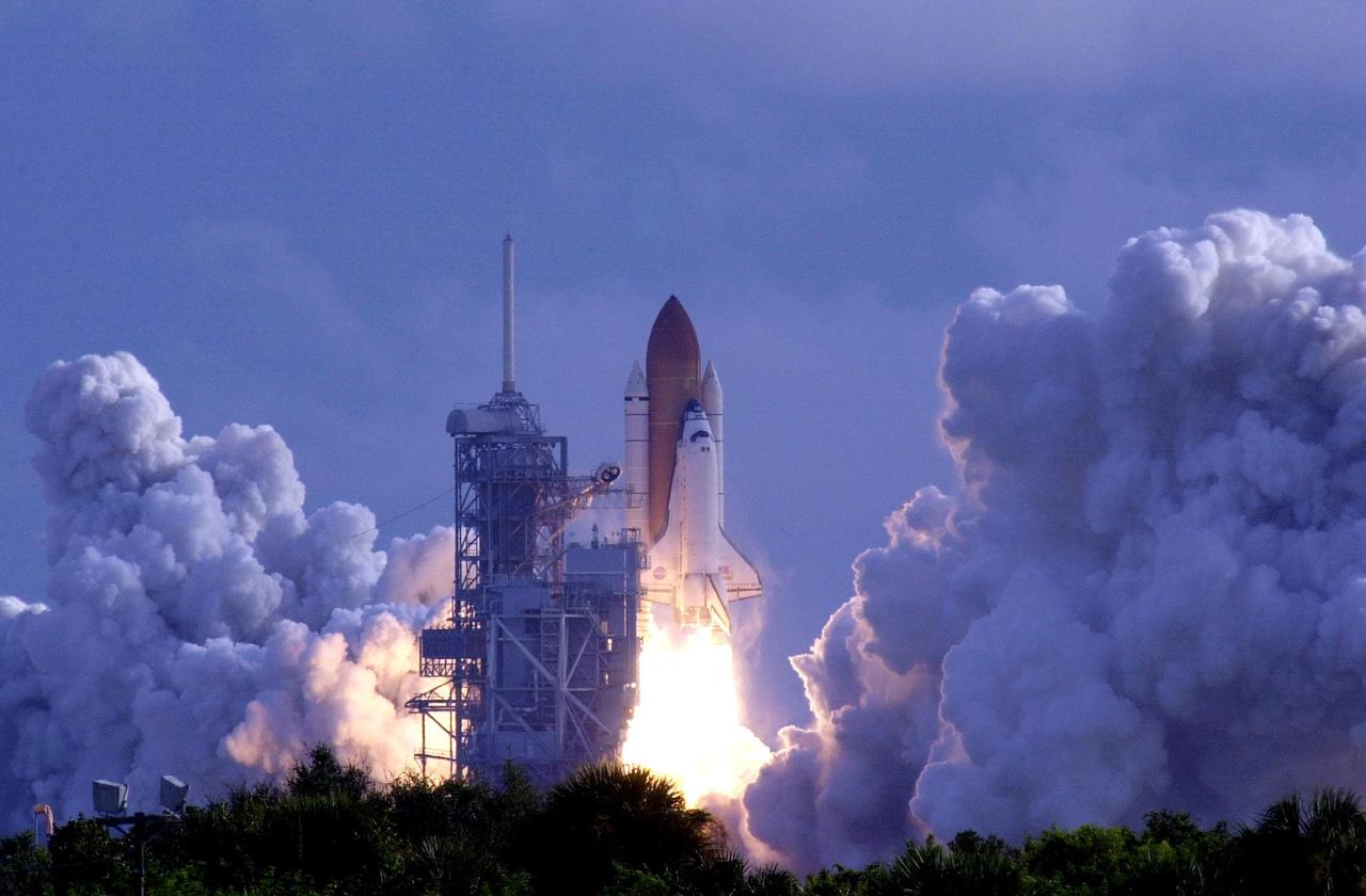 KENNEDY SPACE CENTER, Fla. -- Belching clouds of steam and smoke across the scrub lands at KSC, Space Shuttle Atlantis hurtles toward space on mission STS-106 after liftoff at 8:45:47 a.m. EDT today. On the 11-day mission to the International Space Station, the seven-member crew will perform support tasks on orbit, transfer supplies and prepare the living quarters in the newly arrived Zvezda Service Module. The first long-duration crew, dubbed “Expedition One,” is due to arrive at the Station in late fall. Landing of Atlantis is targeted for 4:45 a.m. EDT on Sept. 19