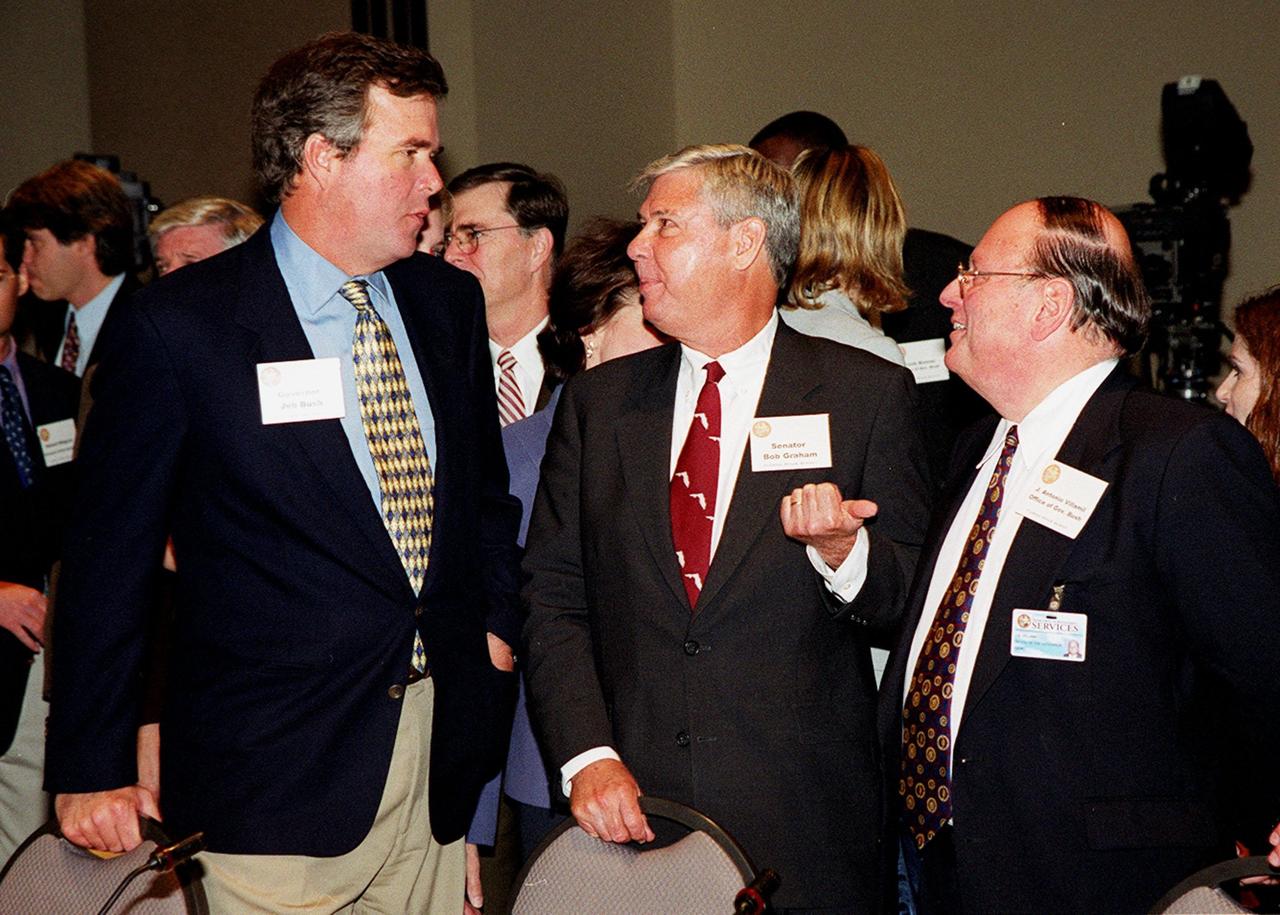 During the First Florida Space Summit, held at the Kennedy Space Center Visitor Complex, Florida Gov. Jeb Bush, Senator Bob Graham and F.J. Antonio Vittamil, with the governor's office, take a break. The event, featuring a discussion on the future of space as it relates to the State of Florida and moderated by Center Director Roy Bridges, included other participants such as Rep. Dave Weldon, NASA Administrator Dan Goldin, 45th Space Wing Commander Brig. Gen. Donald Pettit and heads of aerospace companies