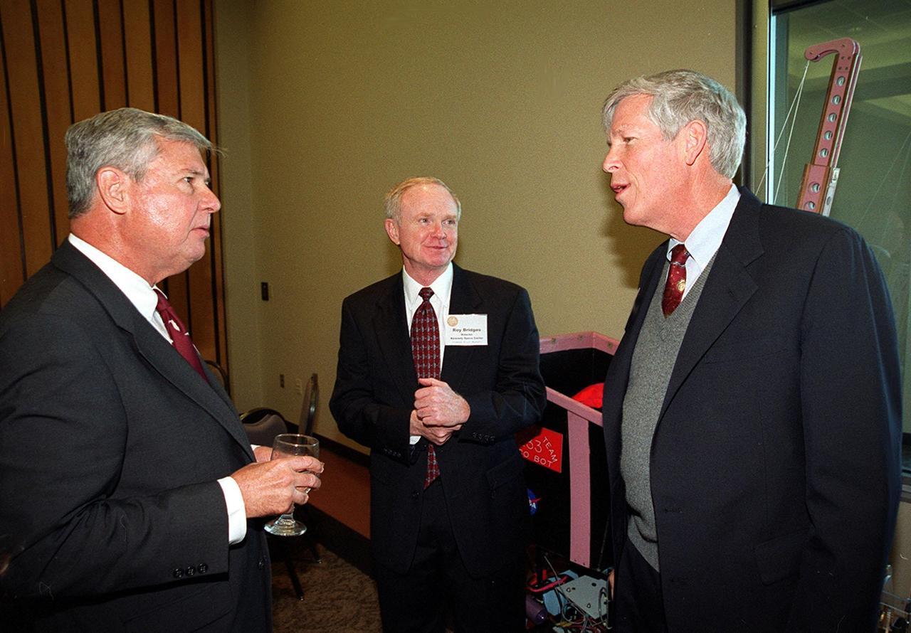 Senator Bob Graham (left), Center Director Roy Bridges (center) and Senator Connie Mack (right) take a break during the First Florida Space Summit, held at the Kennedy Space Center Visitor Complex. The summit featured key state officials and aerospace companies discussing the future of space as it relates to the State of Florida. Moderated by Bridges, the event also included State Senator Patsy Kurth, Representative Dave Weldon, and 45th Space Wing Commander Brig. Gen. Donald Pettit
