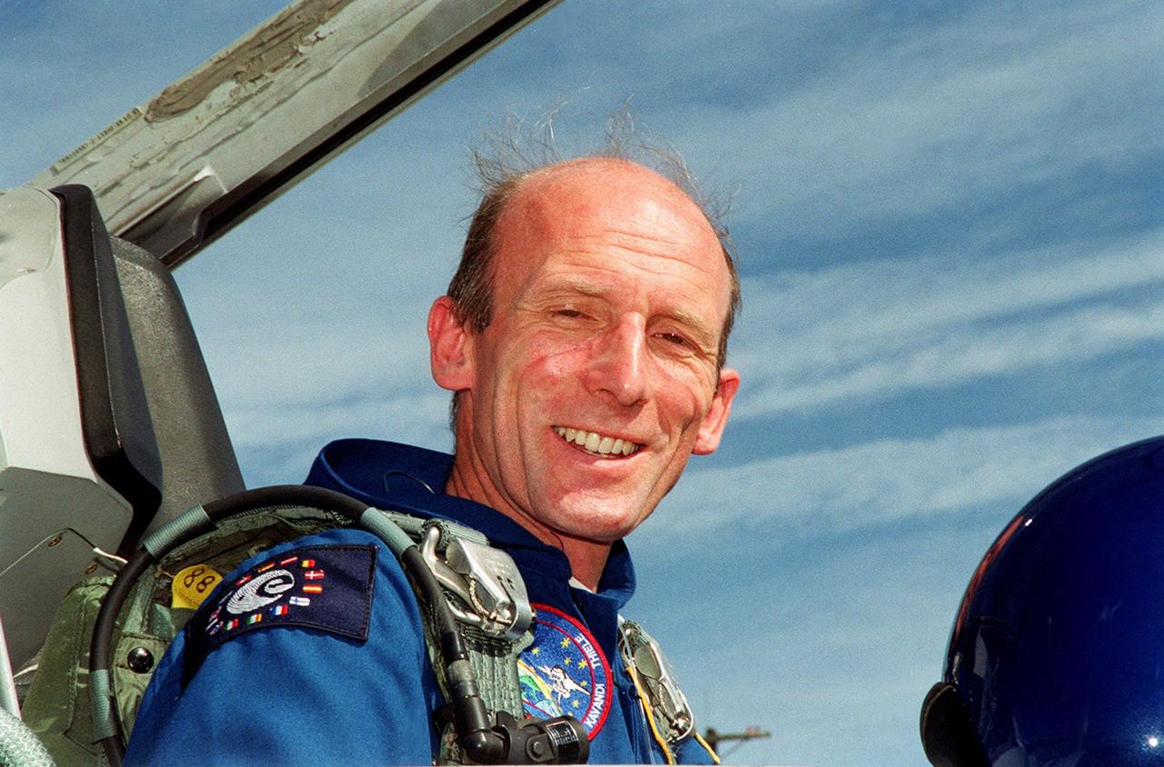 STS-99 Mission Specialist Gerhard P.J. Thiele (Ph.D.), with the European Space Agency, arrives at KSC aboard a T-38 jet aircraft to prepare for launch of Endeavour Jan. 31 at 12:47 p.m. EST. Over the next few days, the crew will review mission procedures, conduct test flights in the Shuttle Training Aircraft and undergo routine preflight medical exams. STS-99 is the Shuttle Radar Topography Mission, which will chart a new course, using two antennae and a 200-foot-long section of space station-derived mast protruding from the payload bay to produce unrivaled 3-D images of the Earth's surface. The result of the Shuttle Radar Topography Mission could be close to 1 trillion measurements of the Earth's topography. Besides contributing to the production of better maps, these measurements could lead to improved water drainage modeling, more realistic flight simulators, better locations for cell phone towers, and enhanced navigation safety