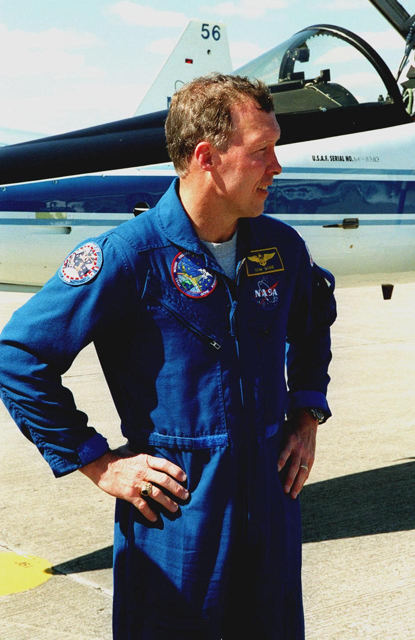 After landing at the Shuttle Landing Facility aboard a T-38 jet aircraft, STS-99 Pilot Dominic Gorie stands ready to prepare for the second launch attempt of Endeavour Feb. 11 at 12:30 p.m. EST from Launch Pad 39A. The earlier launch scheduled for Jan. 31 was scrubbed due to poor weather and a faulty Enhanced Master Events Controller in the orbiter's aft compartment. Over the next few days, the crew will review mission procedures, conduct test flights in the Shuttle Training Aircraft and undergo routine preflight medical exams. STS-99 is the Shuttle Radar Topography Mission, which will produce unrivaled 3-D images of the Earth's surface. The result of the Shuttle Radar Topography Mission could be close to 1 trillion measurements of the Earth's topography. Landing is expected at KSC on Feb. 22 at 4:36 p.m. EST