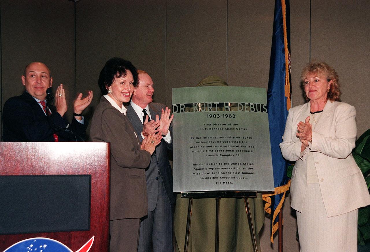 At the opening of the Early Space Education and Conference Center, KSC Visitor Complex, the facility is dedicated to Dr.Kurt H. Debus, who served as the first director of the John F. Kennedy Space Center, 1962-1974. Attending the dedication are (left to right) Delaware North President Rick Abramson, Ute Debus, Center Director Roy Bridges and Sigi Debus Northcutt. Ute and Sigi are the daughters of Dr. Debus