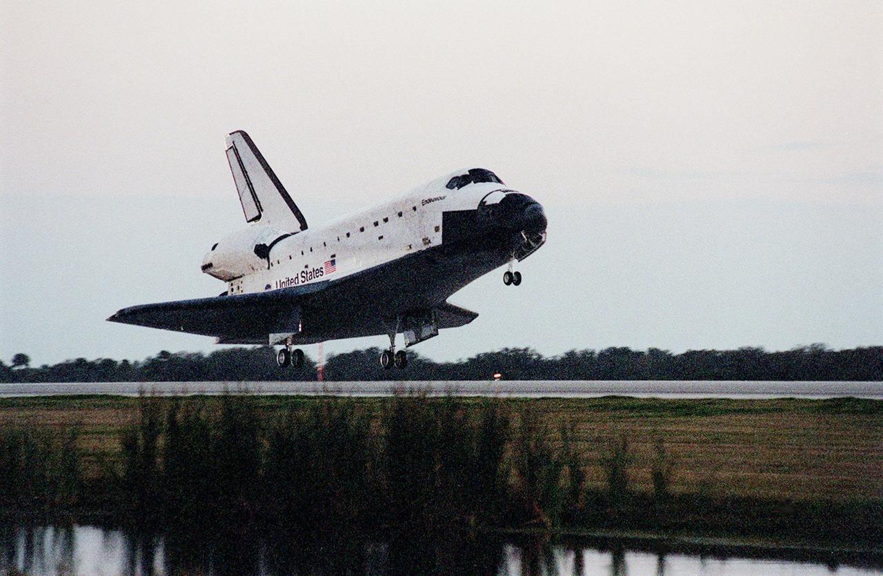 KENNEDY SPACE CENTER, Fla. -- Just after sundown, Space Shuttle Endeavour approaches touchdown on KSC's Shuttle Landing Facility Runway 33 to complete the 11-day, 5-hour, 38-minute-long STS-99 mission. Main gear touchdown was at 6:22:23 p.m. EST Feb. 22 , landing on orbit 181 of the mission. Nose gear touchdown was at 6:22:35 p.m.. EST, and wheel stop at 6:23:25 p.m. EST. At the controls are Commander Kevin Kregel and Pilot Dominic Gorie. Also onboard the orbiter are Mission Specialists Janet Kavandi, Janice Voss, Mamoru Mohri of Japan and Gerhard Thiele of Germany. Mohri is with the National Space Development Agency (NASDA) and Thiele is with the European Space Agency. The crew are returning from the Shuttle Radar Topography Mission, after mapping more than 47 million square miles of the Earth. This was the 97th flight in the Space Shuttle program and the 14th for Endeavour, also marking the 50th landing at KSC, the 21st consecutive landing at KSC, and the 28th in the last 29 Shuttle flights