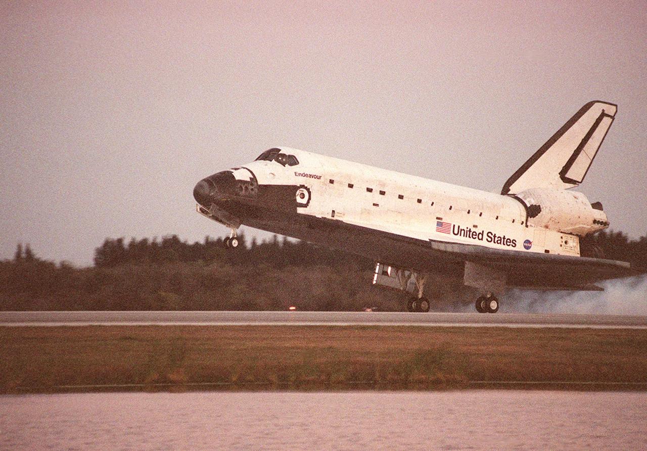 KENNEDY SPACE CENTER, FLA. -- In the waning light after sundown, Space Shuttle Endeavour touches down on KSC's Shuttle Landing Facility Runway 33 to complete the 11-day, 5-hour, 38-minute-long STS-99 mission. At the controls are Commander Kevin Kregel and Pilot Dominic Gorie. Also onboard the orbiter are Mission Specialists Janet Kavandi, Janice Voss, Mamoru Mohri of Japan and Gerhard Thiele of Germany. Mohri is with the National Space Development Agency (NASDA) and Thiele is with the European Space Agency. The crew is returning from the Shuttle Radar Topography Mission after mapping more than 47 million square miles of the Earth's surface. Main gear touchdown was at 6:22:23 p.m. EST Feb. 22 , landing on orbit 181 of the mission. Nose gear touchdown was at 6:22:35 p.m.. EST, and wheel stop at 6:23:25 p.m. EST. This was the 97th flight in the Space Shuttle program and the 14th for Endeavour, also marking the 50th landing at KSC, the 21st consecutive landing at KSC, and the 28th in the last 29 Shuttle flights