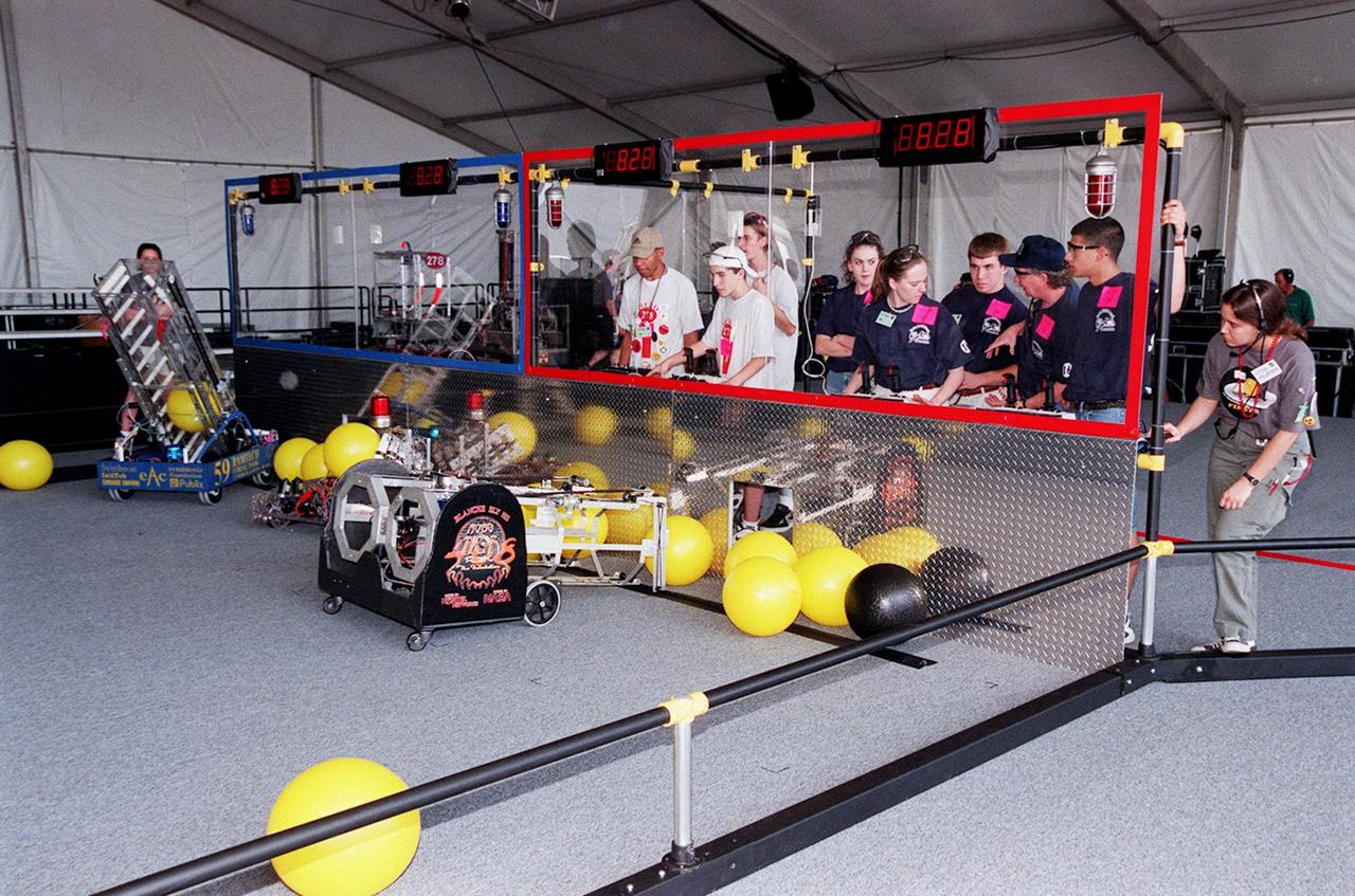 Two student teams test their robots in practice sessions before the start of the FIRST (For Inspiration and Recognition of Science and Technology) Southeast Regional competition March 9-11 at the KSC Visitor Complex. Teams of high school students are testing the limits of their imagination using robots they have designed, with the support of business and engineering professionals and corporate sponsors, to compete in a technological battle against other schools' robots. Of the 30 high school teams competing at KSC, 16 are Florida teams co-sponsored by NASA and KSC contractors. Local high schools participating are Astronaut, Bayside, Cocoa Beach, Eau Gallie, Melbourne, Melbourne Central Catholic, Palm Bay, Rockledge, Satellite, and Titusville