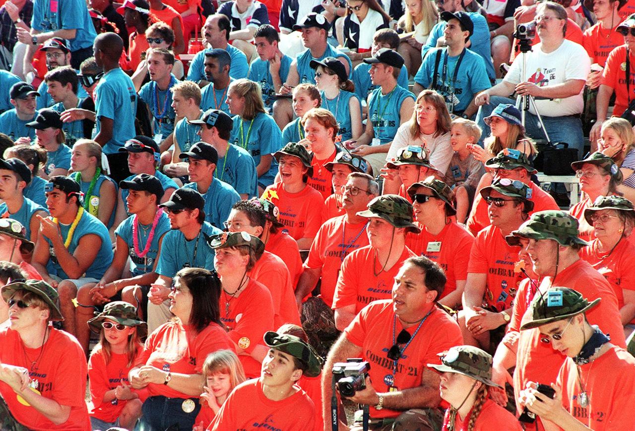 FIRST teams watch robots in action during the FIRST competition. Students from all over the country are at the KSC Visitor Complex for the FIRST (For Inspiration and Recognition of Science and Technology) Southeast Regional competition March 9-11 in the Rocket Garden. Teams of high school students are testing the limits of their imagination using robots they have designed, with the support of business and engineering professionals and corporate sponsors, to compete in a technological battle against other schools' robots. Of the 30 high school teams competing, 16 are Florida teams co-sponsored by NASA and KSC contractors. Local high schools participating are Astronaut, Bayside, Cocoa Beach, Eau Gallie, Melbourne, Melbourne Central Catholic, Palm Bay, Rockledge, Satellite, and Titusville