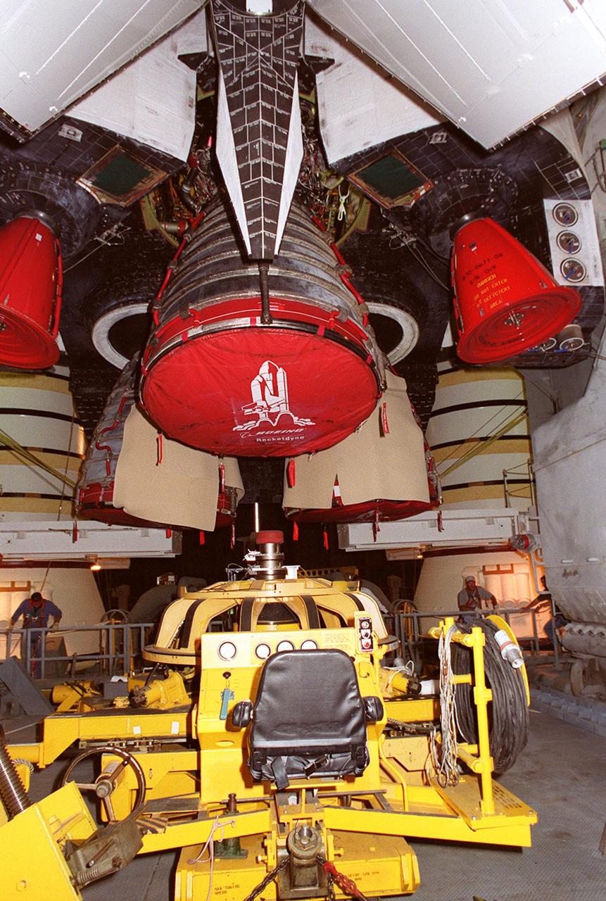 KENNEDY SPACE CENTER, FLA. -- The equipment is in place to remove Main Engine No. 1 from Space Shuttle Atlantis in the Vehicle Assembly Building. An inventory review concerning defective main engine fuel pump tip seals indicated that defective seals may be present on the fuel pump for the engine. The decision was made to replace the suspect engine with one originally slated for Discovery. The main engine nozzles, visible in the photo, are 7.8 feet across and 9.4 feet high. Space Shuttle Atlantis is scheduled to launch no earlier than April 17, 2000, on mission STS-101 to resupply the International Space Station for the arrival of the next pressurized module, the Russian-built Zvezda