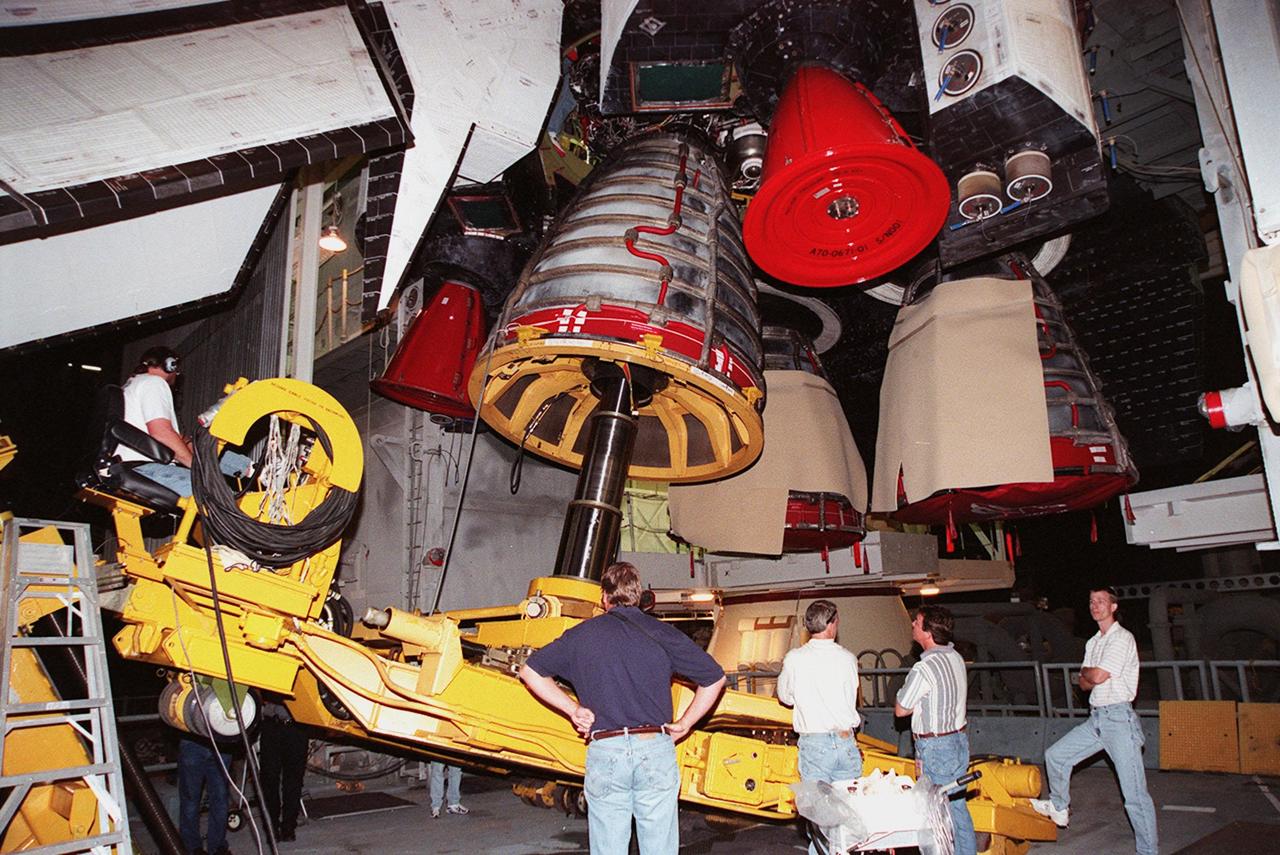 KENNEDY SPACE CENTER, FLA. -- A replacement engine is installed in Space Shuttle Atlantis. Main Engine No. 1 was removed after an inventory review concerning defective main engine fuel pump tip seals indicated that defective seals might be present on the previous fuel pump for the engine. The decision was made to replace the suspect engine with one originally slated for Discovery. The main engine nozzle, visible in the photo, is 7.8 feet across and 9.4 feet high. Space Shuttle Atlantis is scheduled to launch no earlier than April 17, 2000, on mission STS-101 to resupply the International Space Station for the arrival of the next pressurized module, the Russian-built Zvezda