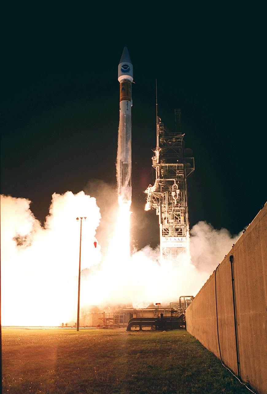 The Atlas II/Centaur rocket carrying the NASA/NOAA weather satellite GOES-L casts a luminescent glow as it starts to clear the tower at Pad A, Complex 36, Cape Canaveral Air Force Station. Liftoff occurred at 3:07 a.m. EDT. The primary objective of the GOES-L is to provide a full capability satellite in an on-orbit storage condition, in order to assure NOAA continuity in services from a two-satellite constellation. Launch services are being provided by the 45th Space Wing. Once in orbit, the spacecraft is to be designated GOES-11 and will complete its 90-day checkout in time for availability during the 2000 hurricane season