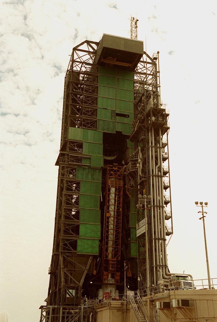 The Atlas IIA rocket is close to its vertical position in the launch tower at Launch Pad 36A, Cape Canaveral Air Force Station (CCAFS). It will be mated with a Centaur upper stage to launch the latest Tracking and Data Relay Satellite (TDRS) June 29 from CCAFS. The Atlas/Centaur launch vehicle is manufactured and operated by Lockheed Martin. Atlas IIA is capable of lifting payload systems weights in the 2,850 kg (6,300 lb) to 3,070 kg (6,760 lb) class to geosynchronous transfer orbit. It is 25 m (82 ft) long and 3.05 m (10 ft) in diameter. The Centaur is 10.0 m (33-ft) long and 3.05 m (10 ft) in diameter