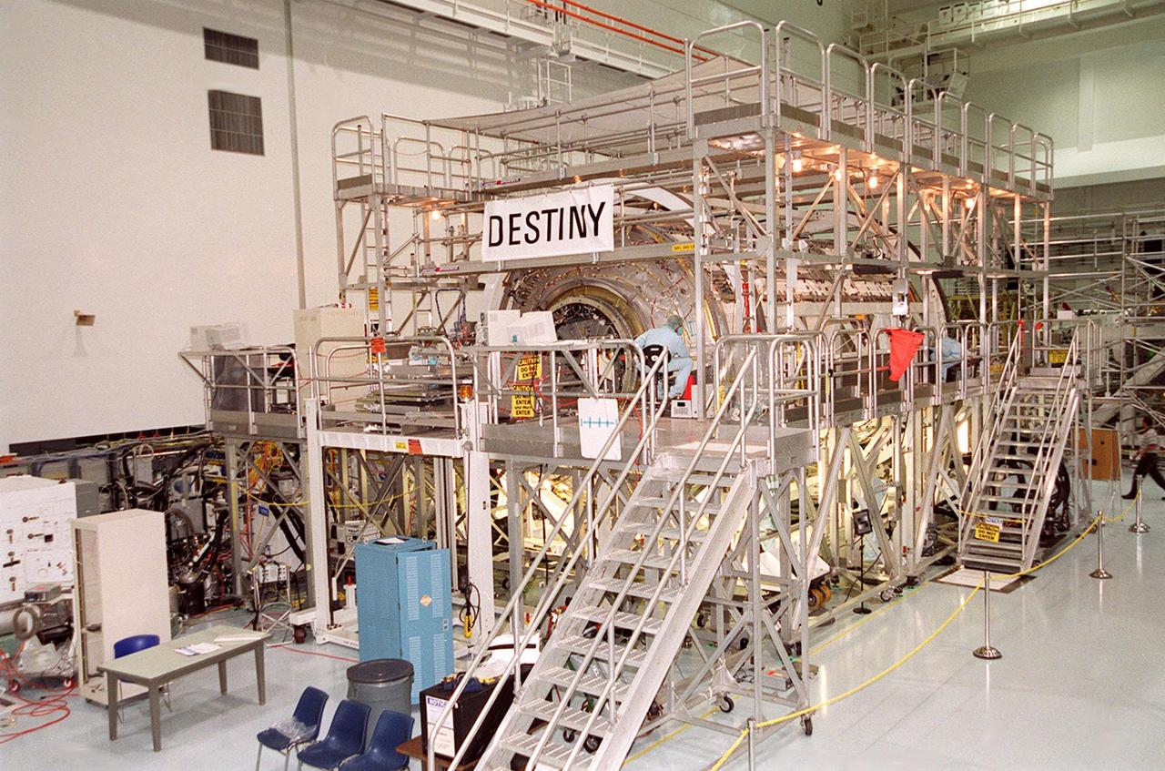 KENNEDY SPACE CENTER, FLA. -- In the Space Station Processing Facility, the U.S. Laboratory Destiny is about to undergo rotation in its workstand. A component of the International Space Station, Destiny is scheduled to fly on mission STS-98 in early 2001. During the mission, the crew will install the Lab during a series of three space walks. The STS-98 mission will provide the station with science research facilities and expand its power, life support and control capabilities. The U.S. Lab module continues a long tradition of microgravity materials research, first conducted by Skylab and later Shuttle and Spacelab missions. Destiny is expected to be a major feature in future research, providing facilities for biotechnology, fluid physics, combustion, and life sciences research