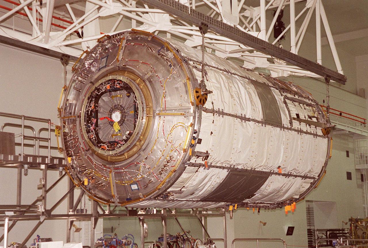 KENNEDY SPACE CENTER, FLA. -- This closeup shows the U.S. Lab Destiny being lifted by an overhead crane to move it to a weigh stand. A component of the International Space Station, Destiny is scheduled to fly on mission STS-98 in early 2001. During the mission, the crew will install the Lab during a series of three space walks. The STS-98 mission will provide the station with science research facilities and expand its power, life support and control capabilities. The U.S. Lab module continues a long tradition of microgravity materials research, first conducted by Skylab and later Shuttle and Spacelab missions. Destiny is expected to be a major feature in future research, providing facilities for biotechnology, fluid physics, combustion, and life sciences research