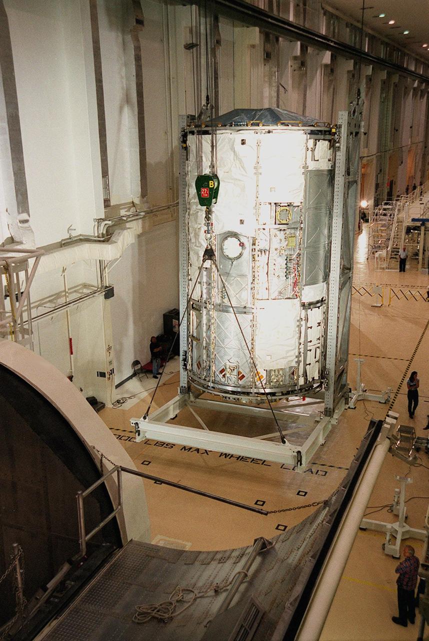 KENNEDY SPACE CENTER, FLA. -- The U.S. Lab, a component of the International Space Station, rests in a vertical position in the Operations and Checkout Building. The Lab, named Destiny, will undergo testing in the altitude chamber in the O&C. Destiny is scheduled to fly on mission STS-98 in early 2001. During the mission, the crew will install the Lab in the Space Station during a series of three space walks. The STS-98 mission will provide the Station with science research facilities and expand its power, life support and control capabilities. The U.S. Lab module continues a long tradition of microgravity materials research, first conducted by Skylab and later Shuttle and Spacelab missions. Destiny is expected to be a major feature in future research, providing facilities for biotechnology, fluid physics, combustion, and life sciences research