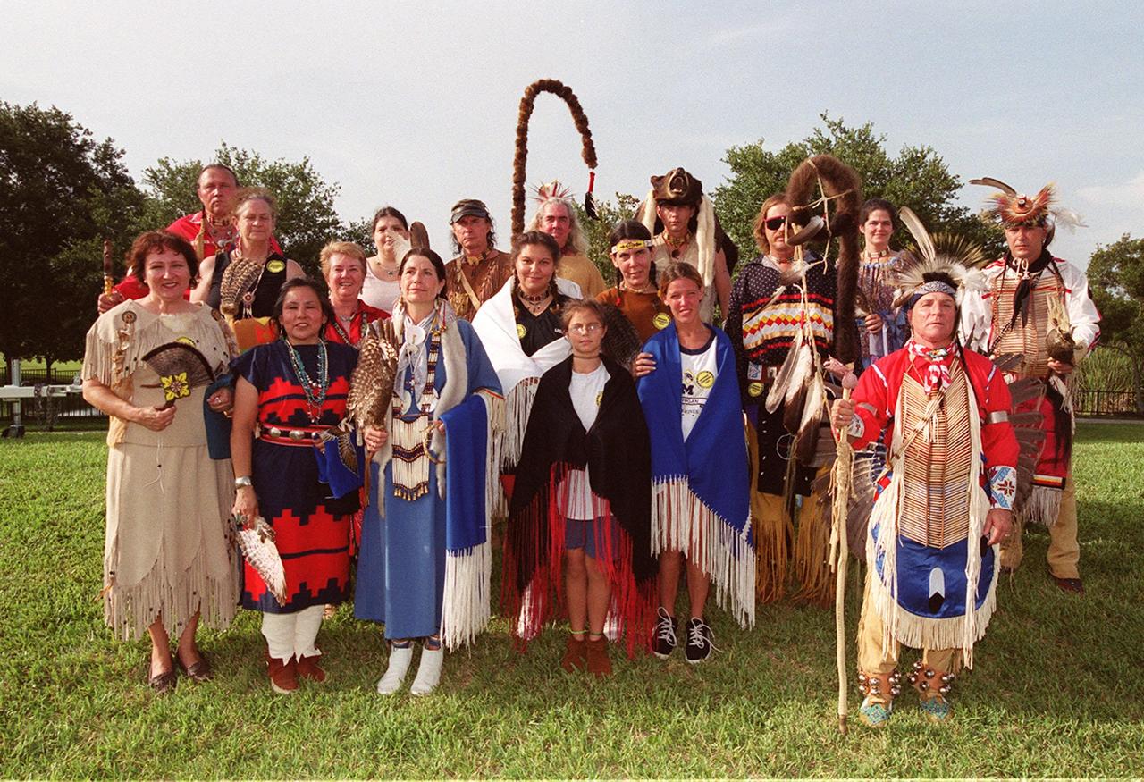 Members of KSC’s Native America International Tribal Council and the Space Coast Indian Association (Brevard County) gather in the KSC Visitor Complex during opening ceremonies of the 2000 International Law Enforcement Games. More than 1,850 participants and their families took part in the opening, held in the Rocket Garden. The ceremony included parades, torch lighting and a tug of war. The games feature officers from 15 countries and 37 United States in competitions around Brevard County, Fla