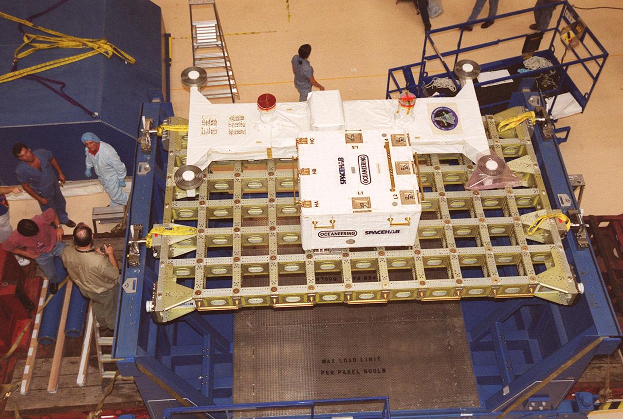 KENNEDY SPACE CENTER, FLA. -- The Integrated Cargo Carrier (ICC), with equipment on top, sits in a workstand in the Space Station Processing Facility. It will be moved into the payload canister for transport to Launch Pad 39B in preparation for mission STS-106, scheduled to launch Sept. 8 at 8:31 a.m. EDT. During the mission to the International Space Station, the crew will complete service module support tasks on orbit, transfer supplies and outfit the Space Station for the first long-duration crew