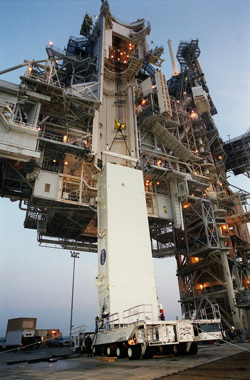 KENNEDY SPACE CENTER, Fla. --  The payload canister arrives at the Rotating Service Structure (RSS) on Launch Pad 39B. The canister with its cargo of the SPACEHAB module and Integrated Cargo Carrier will be lifted up into the Payload Changeout Room near the top of the RSS for transfer to the payload bay of Shuttle Atlantis for mission STS-106. The PCR provides an environmentally controlled facility for the transfer. The 11-day mission to the International Space Station will include service module support tasks on orbit, transfer supplies and outfit the Space Station for the first long-duration crew. Atlantis is scheduled to launch Sept. 8 at 8:31 a.m. EDT.